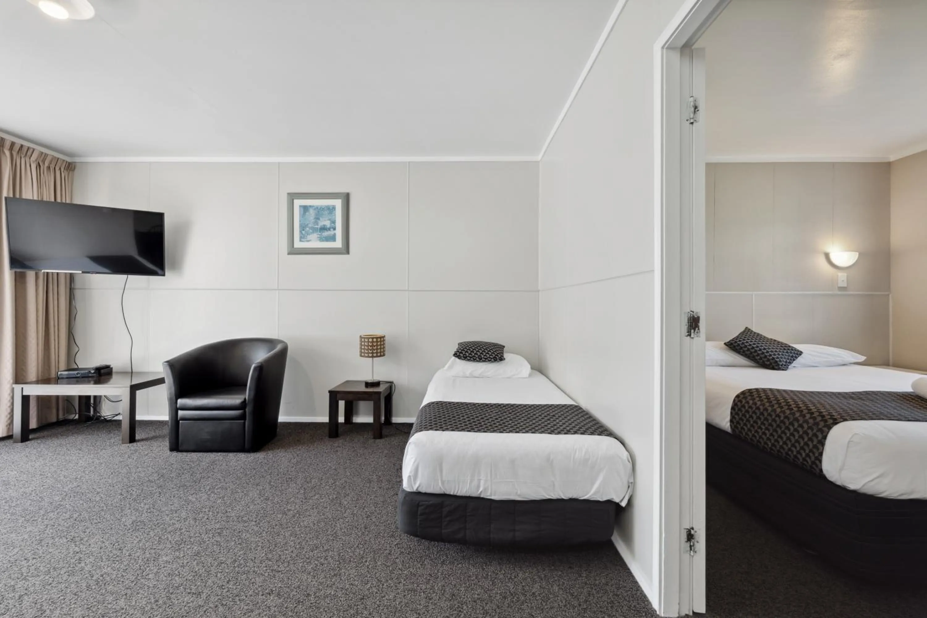 Bed in Flamingo Motel