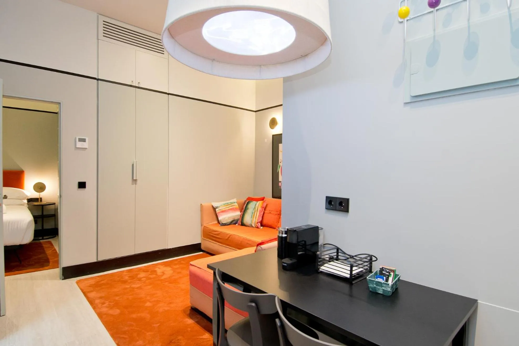 Living room, Bed in Amor de Dios 17 Boutique Apartments