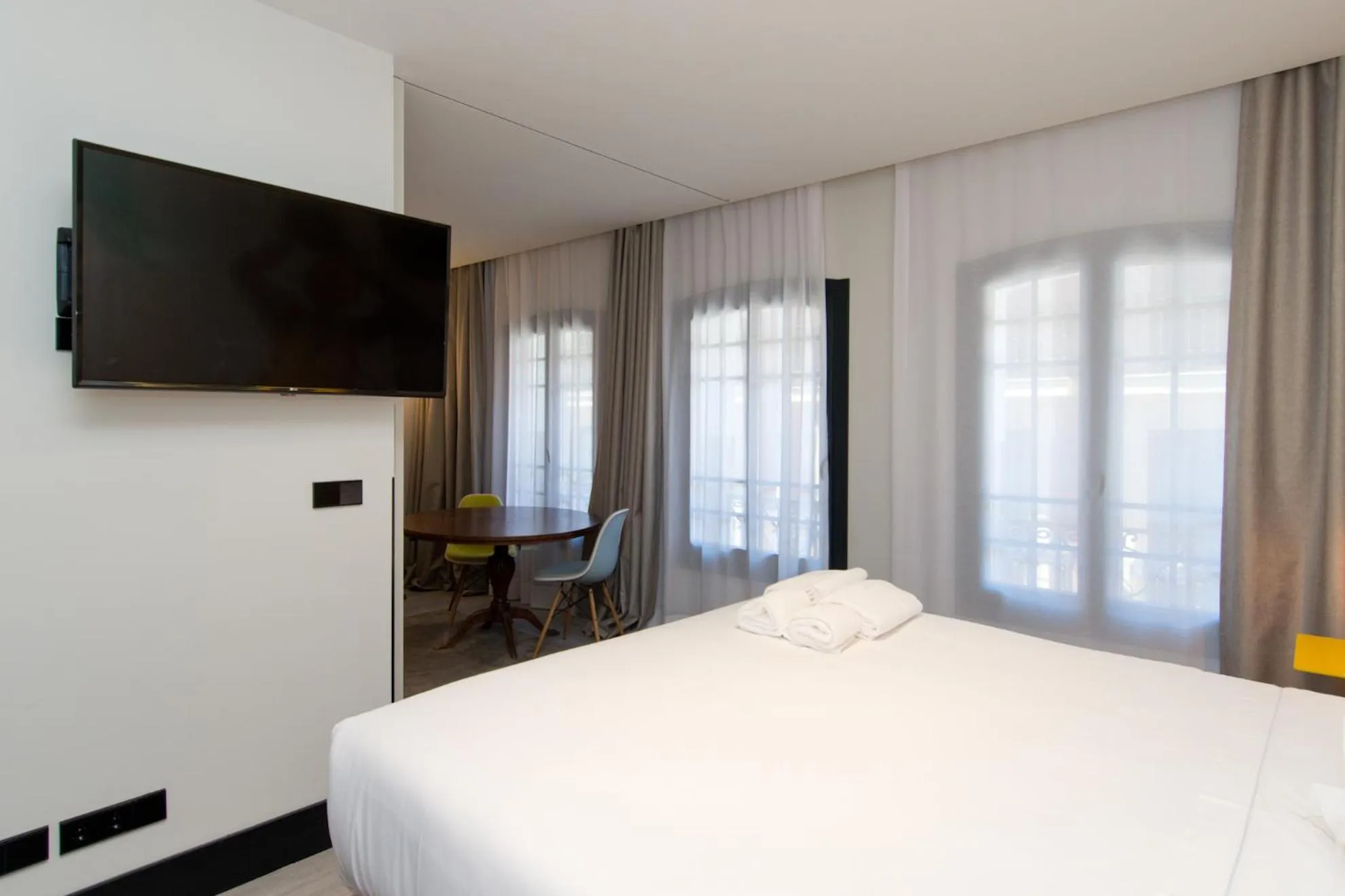 Bed in Amor de Dios 17 Boutique Apartments