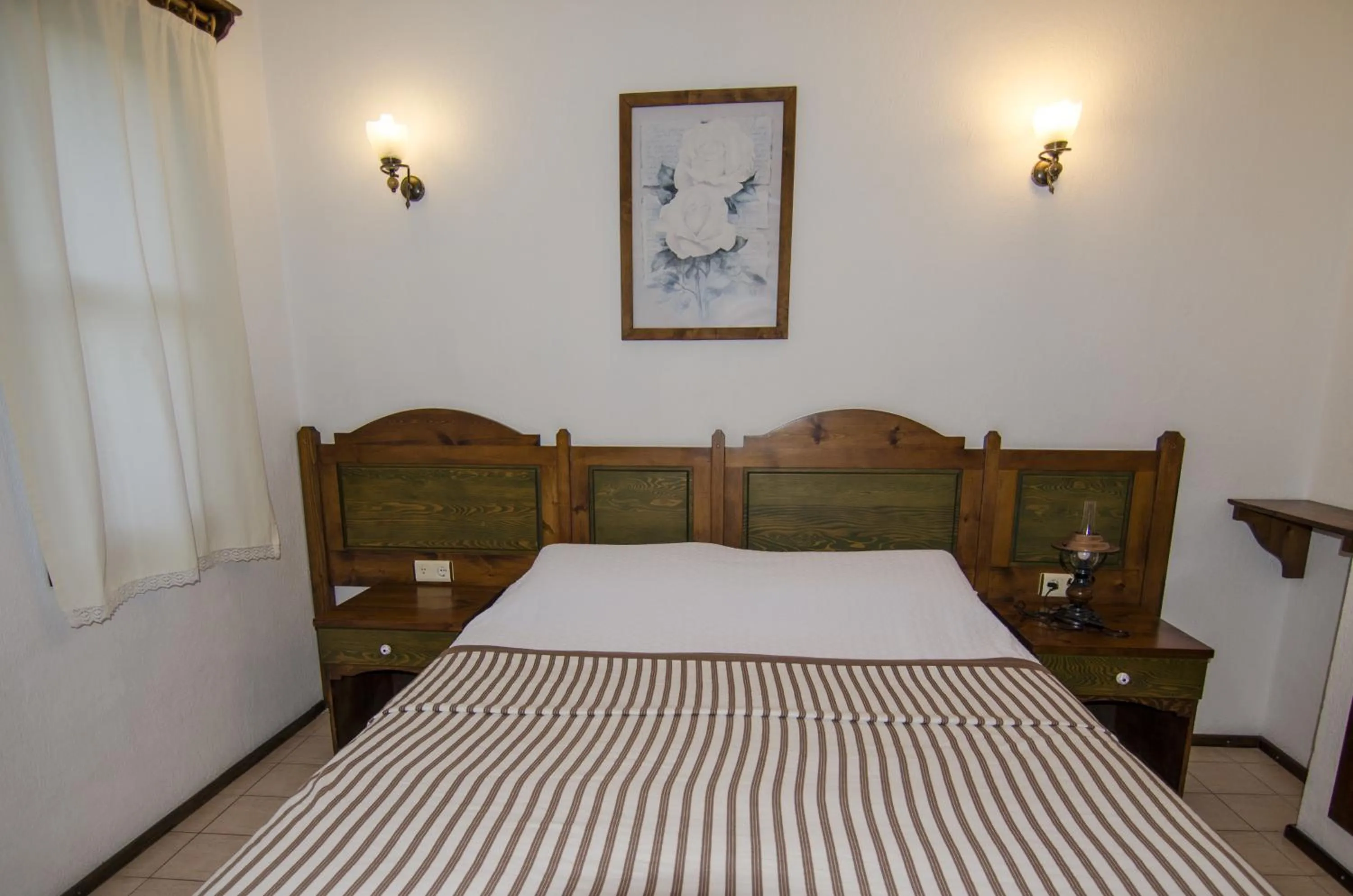 Bed in Olive Garden Apart Hotel