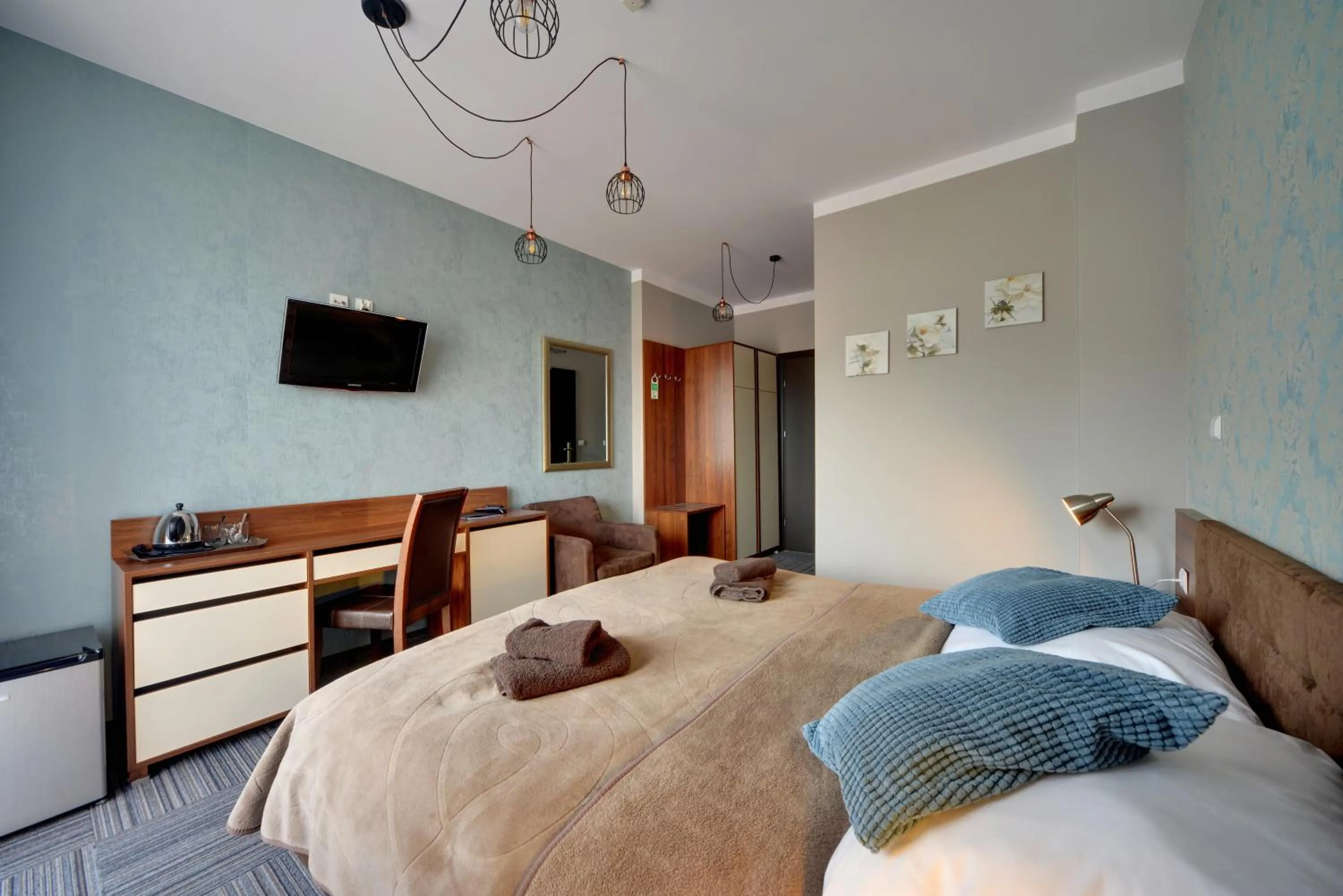 Bed in WILLA PETRUS - CENTRUM BALKONY WINDA ŚNIADANIA RELAKS I WYGODa