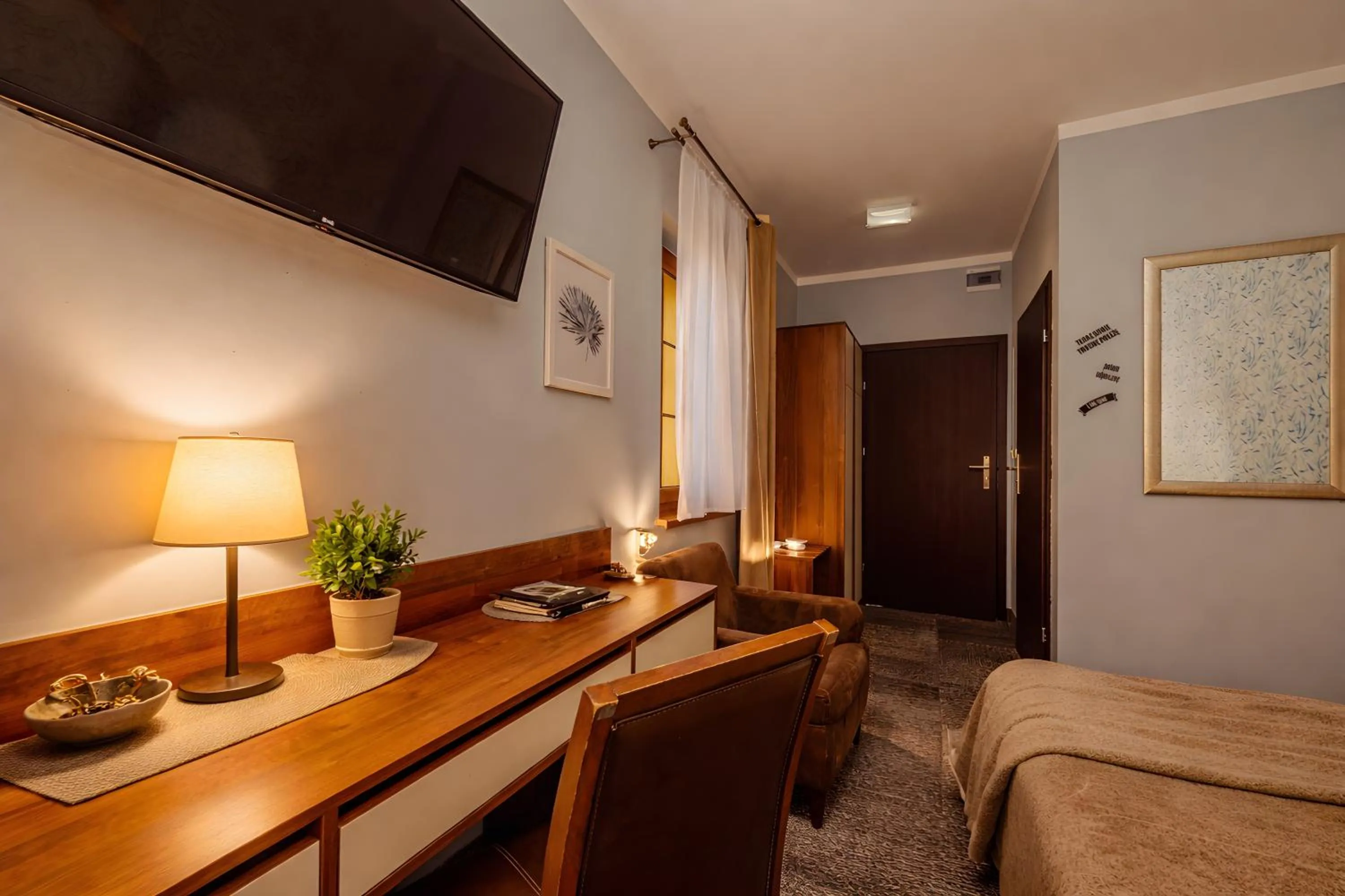 Bed in WILLA PETRUS - CENTRUM BALKONY WINDA ŚNIADANIA RELAKS I WYGODa