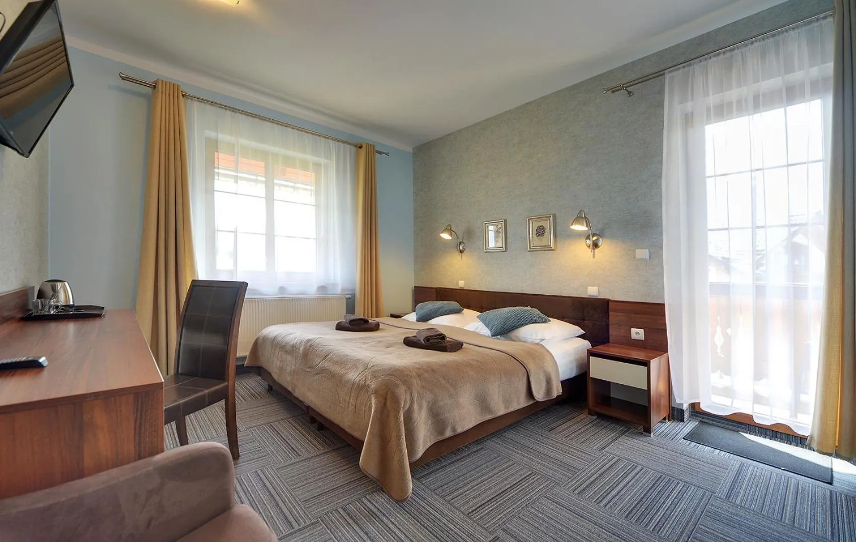 Bed in WILLA PETRUS - CENTRUM BALKONY WINDA ŚNIADANIA RELAKS I WYGODa