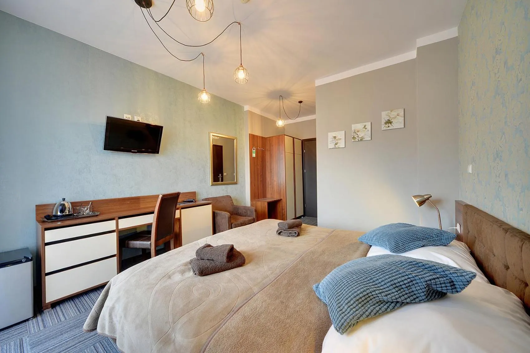 Bed in WILLA PETRUS - CENTRUM BALKONY WINDA ŚNIADANIA RELAKS I WYGODa