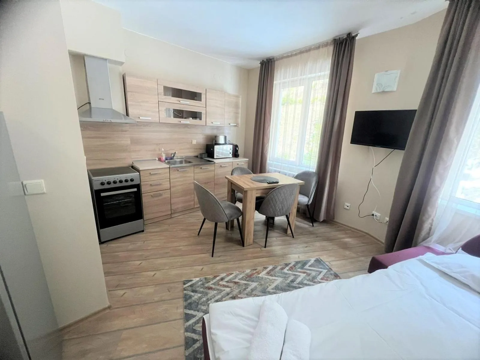 Kitchen or kitchenette, Bed in The Stream Resort Pamporovo