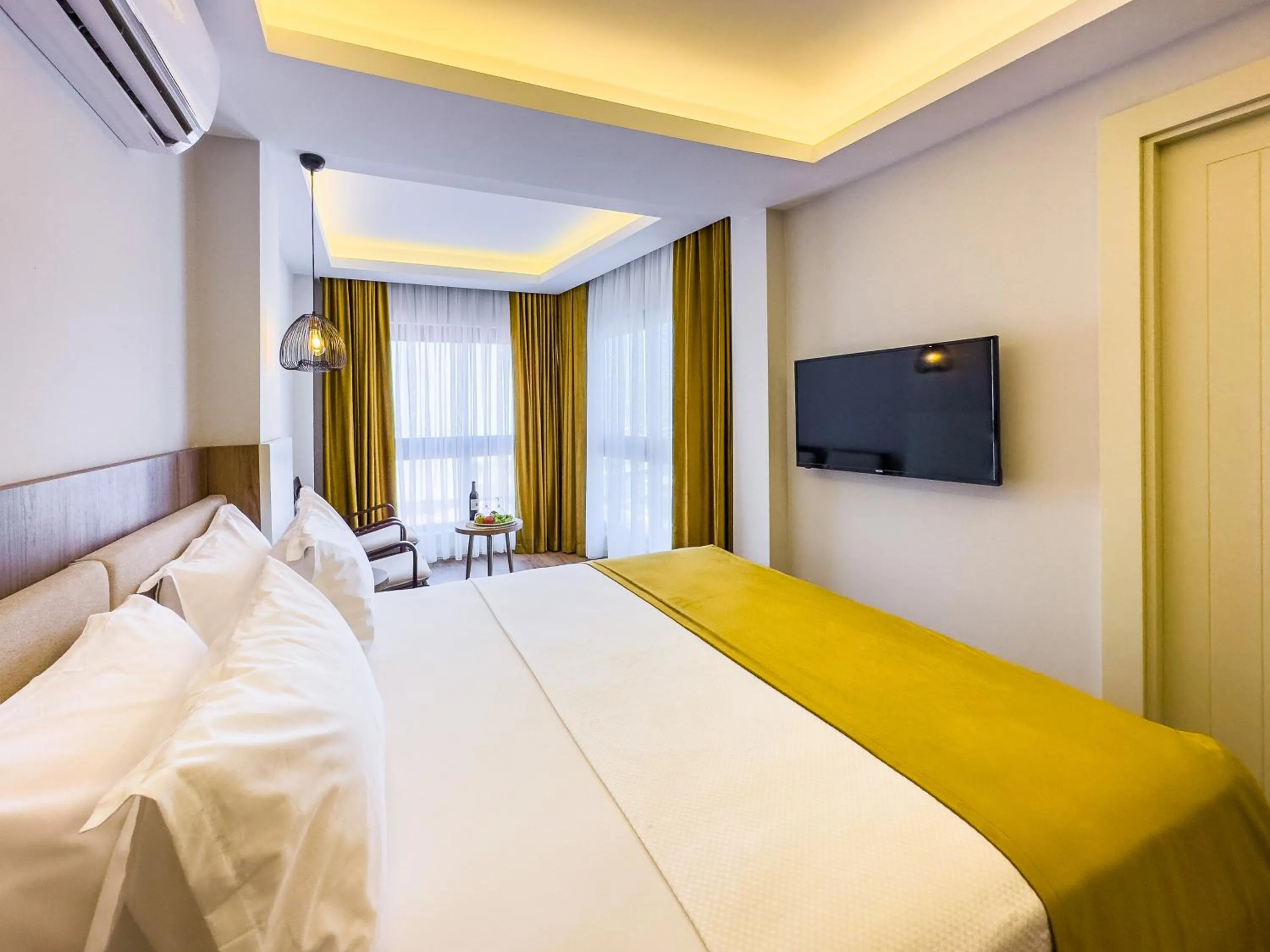 Bed in Dedeoğlu Port Hotel