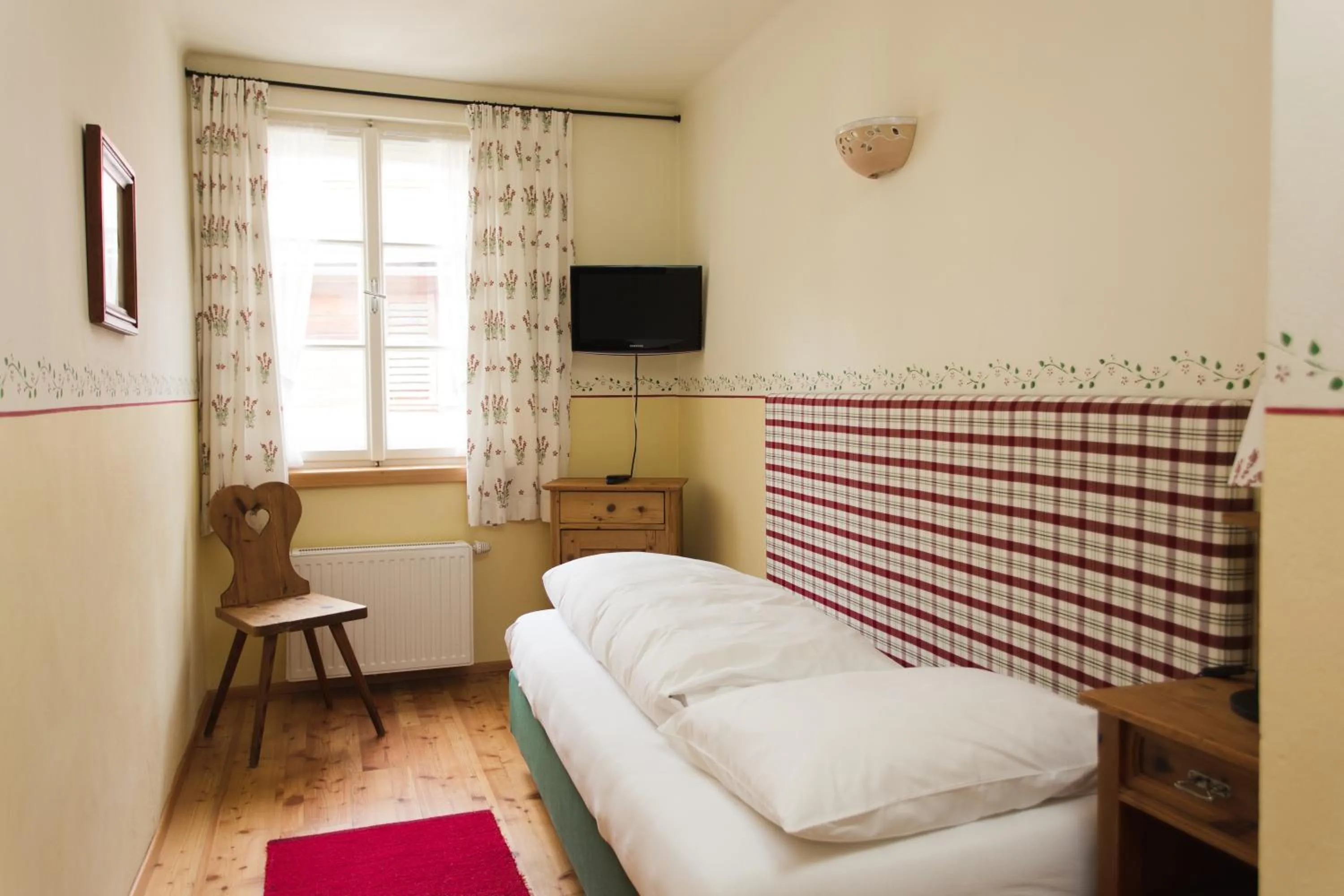 Photo of the whole room, Bed in Hotel-Gasthof Weitgasser