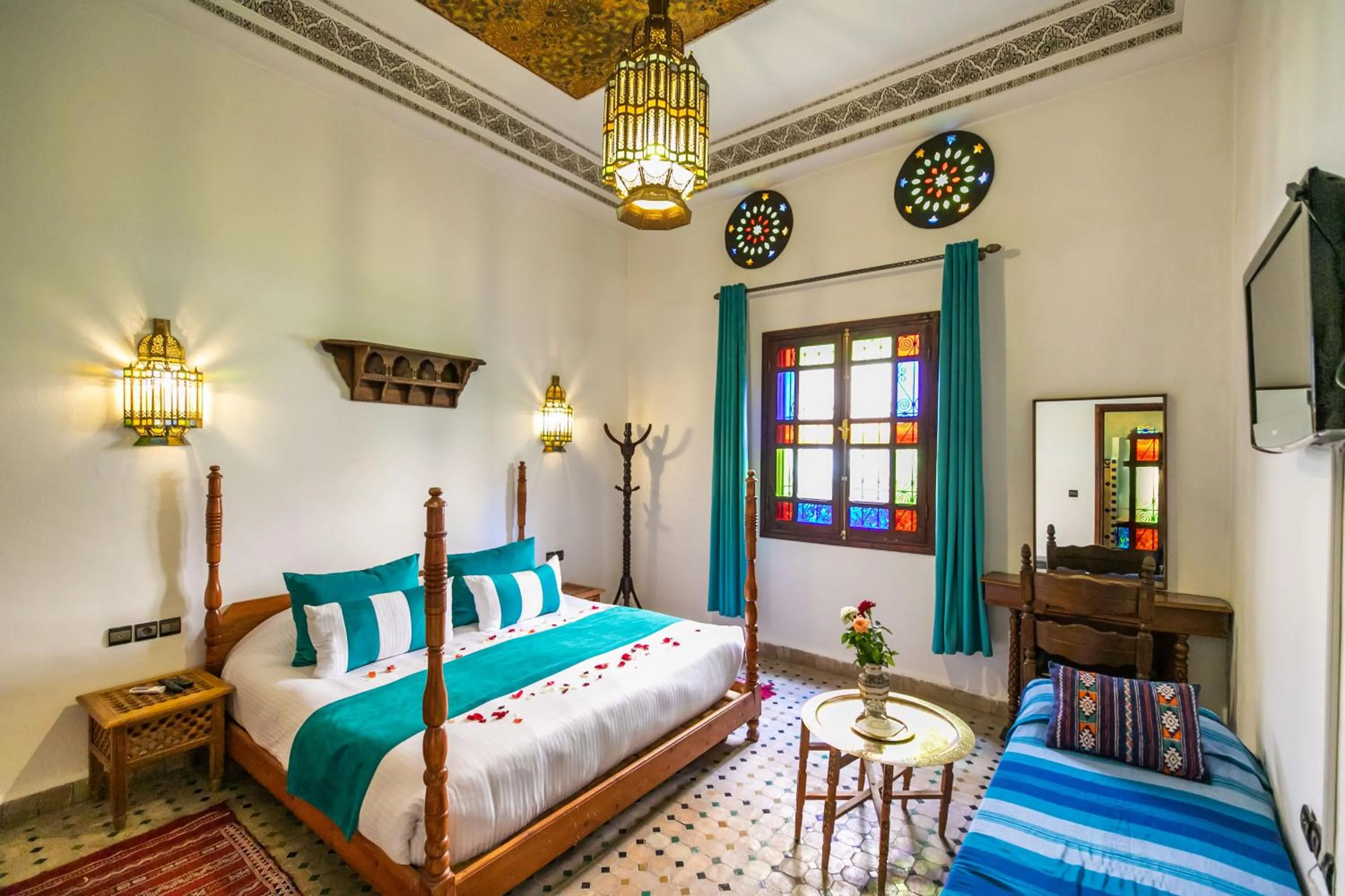 Bed in Riad Jardin Chrifa