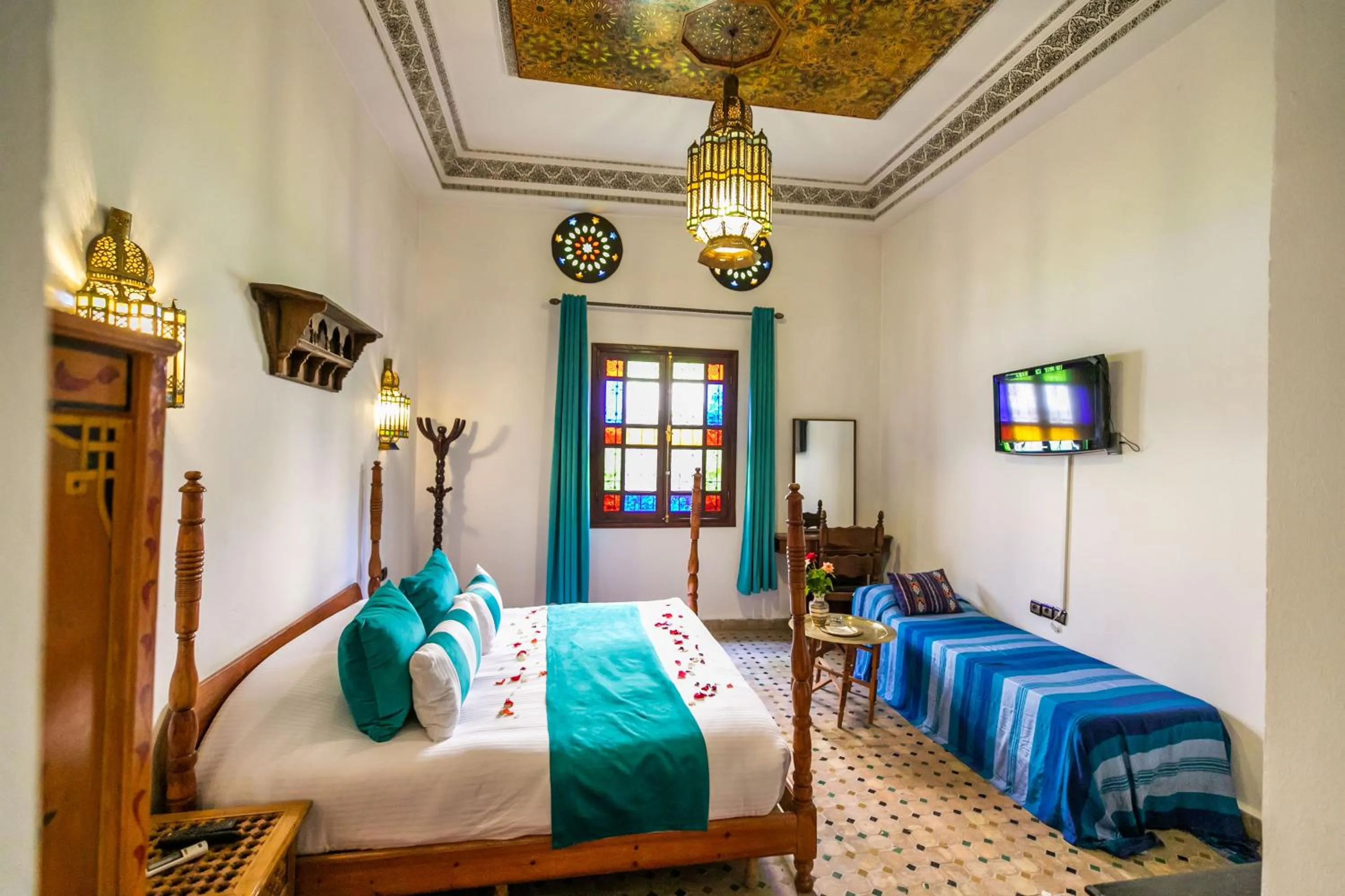 TV and multimedia, Bed in Riad Jardin Chrifa