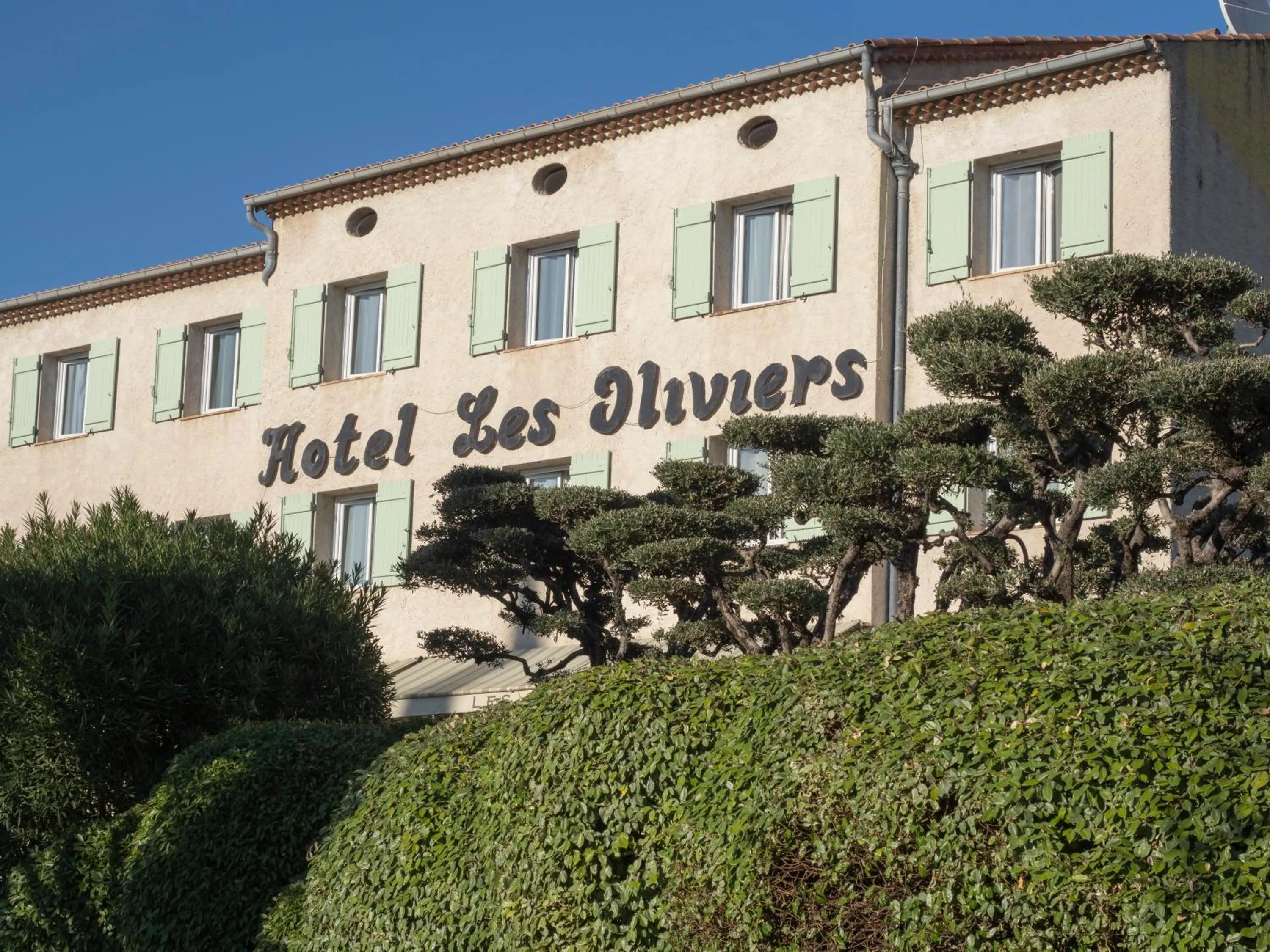 Property logo or sign in Hotel Les Oliviers