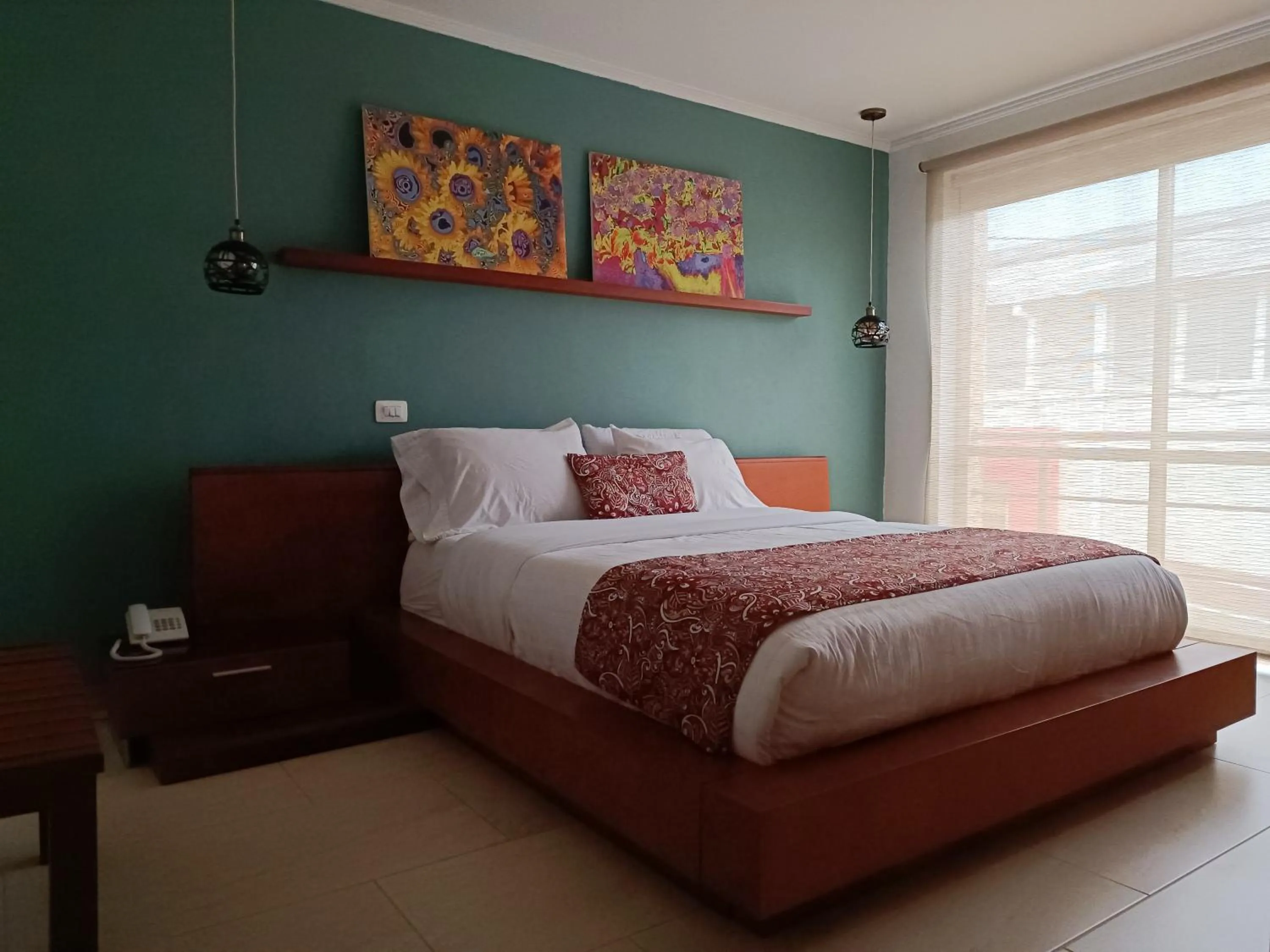 Bed in Hotel Boutique Confort Suites