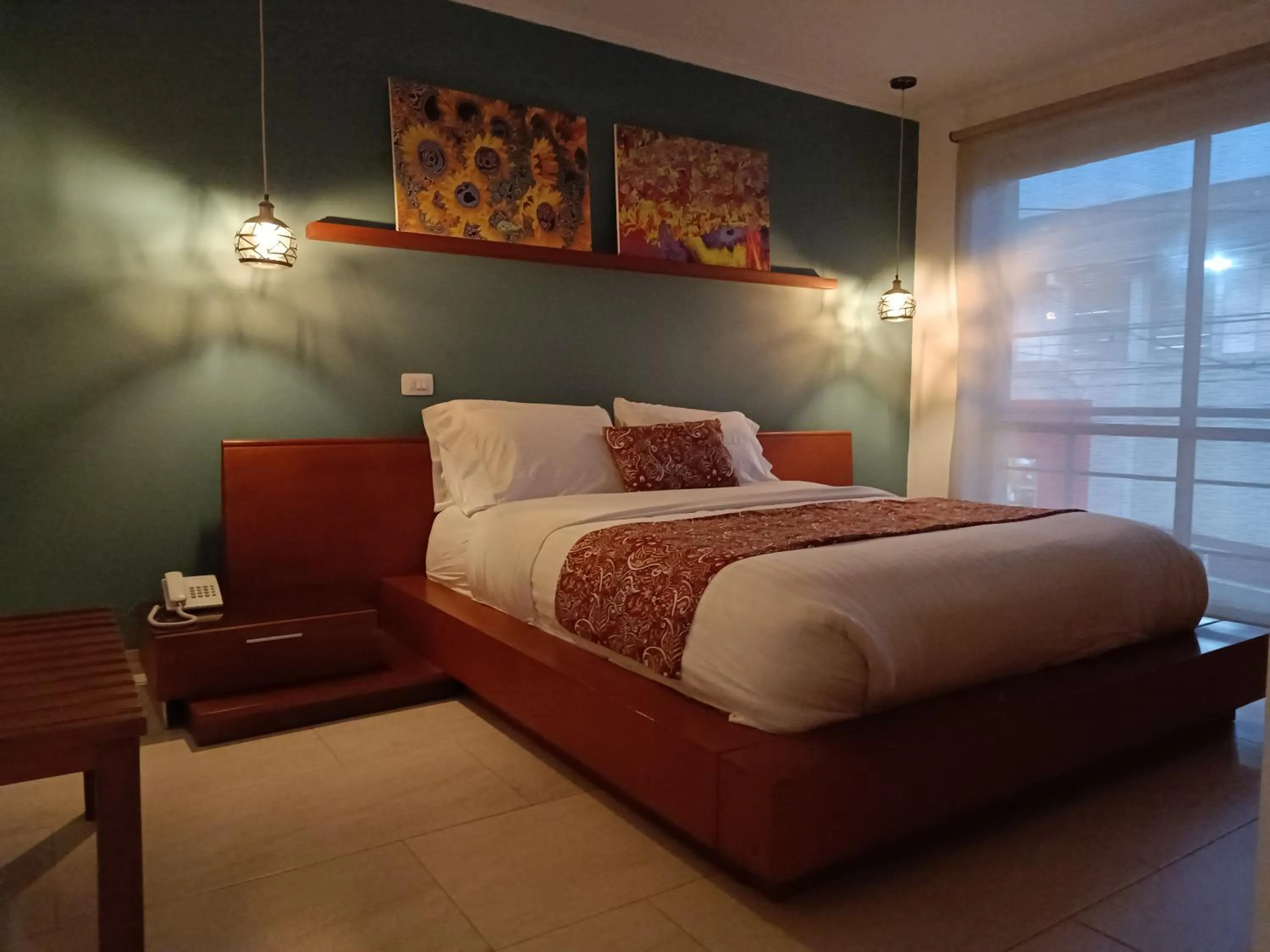 Bed in Hotel Boutique Confort Suites