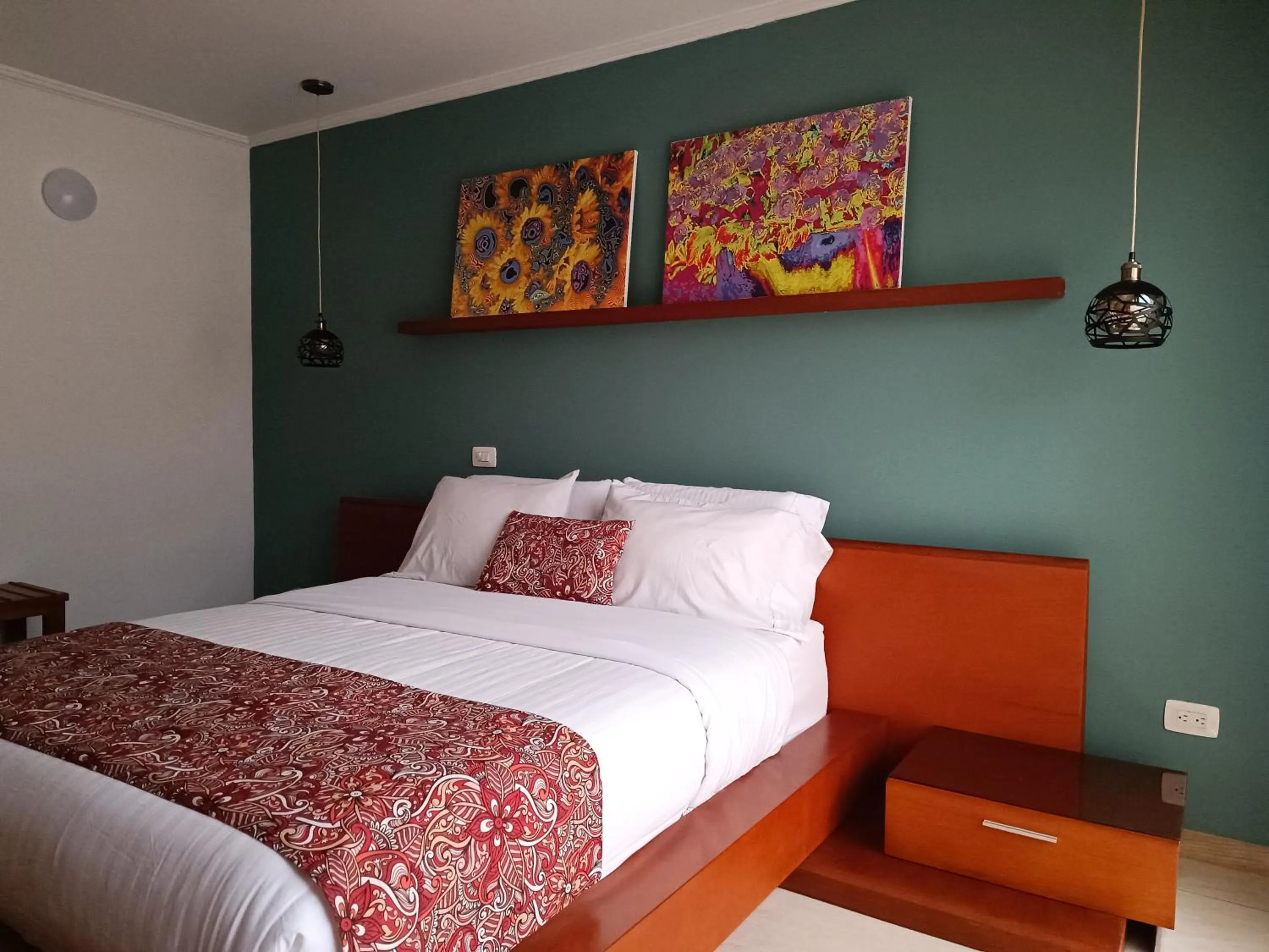 Bed in Hotel Boutique Confort Suites