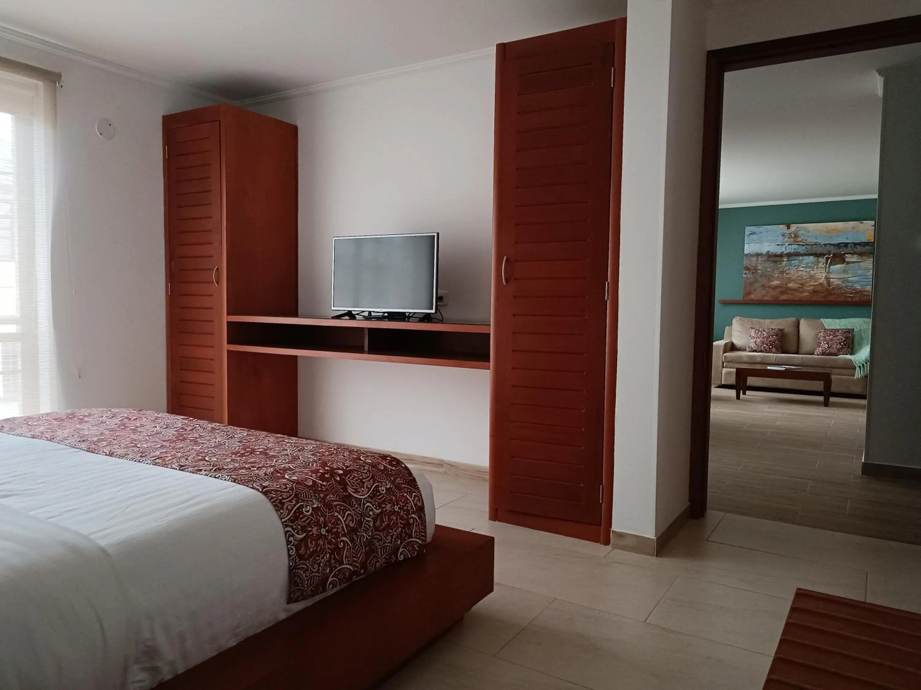 Bed in Hotel Boutique Confort Suites