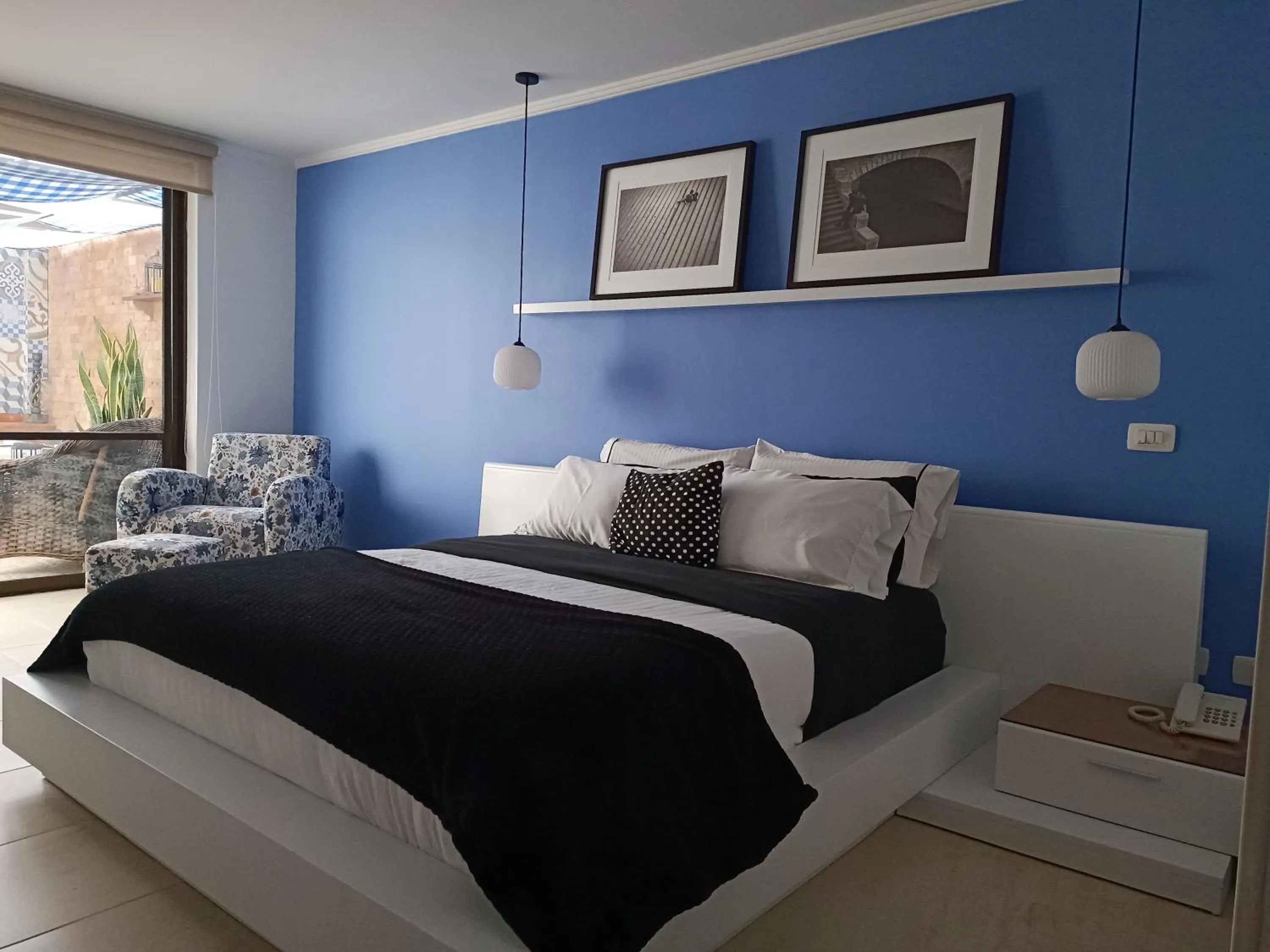 Bed in Hotel Boutique Confort Suites