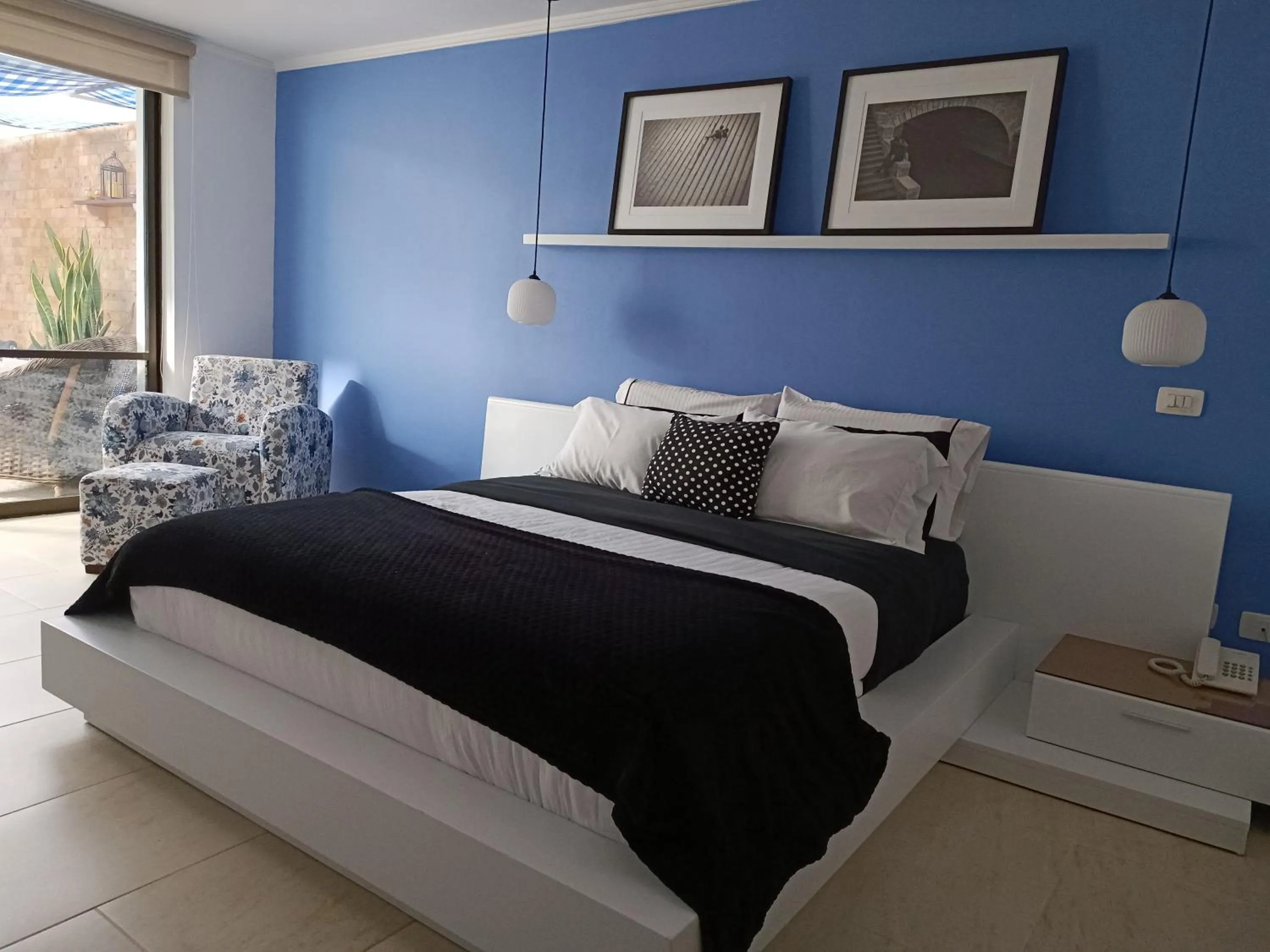 Bed in Hotel Boutique Confort Suites