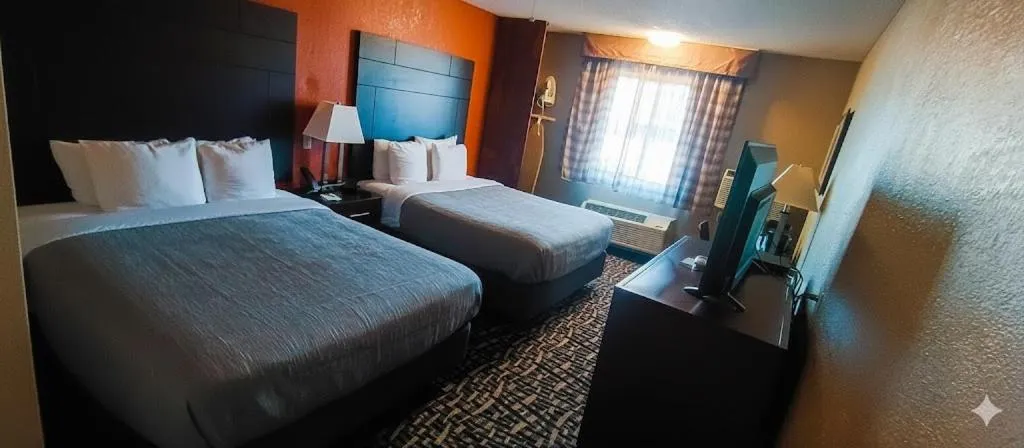 Bed in Quality Inn Lamar