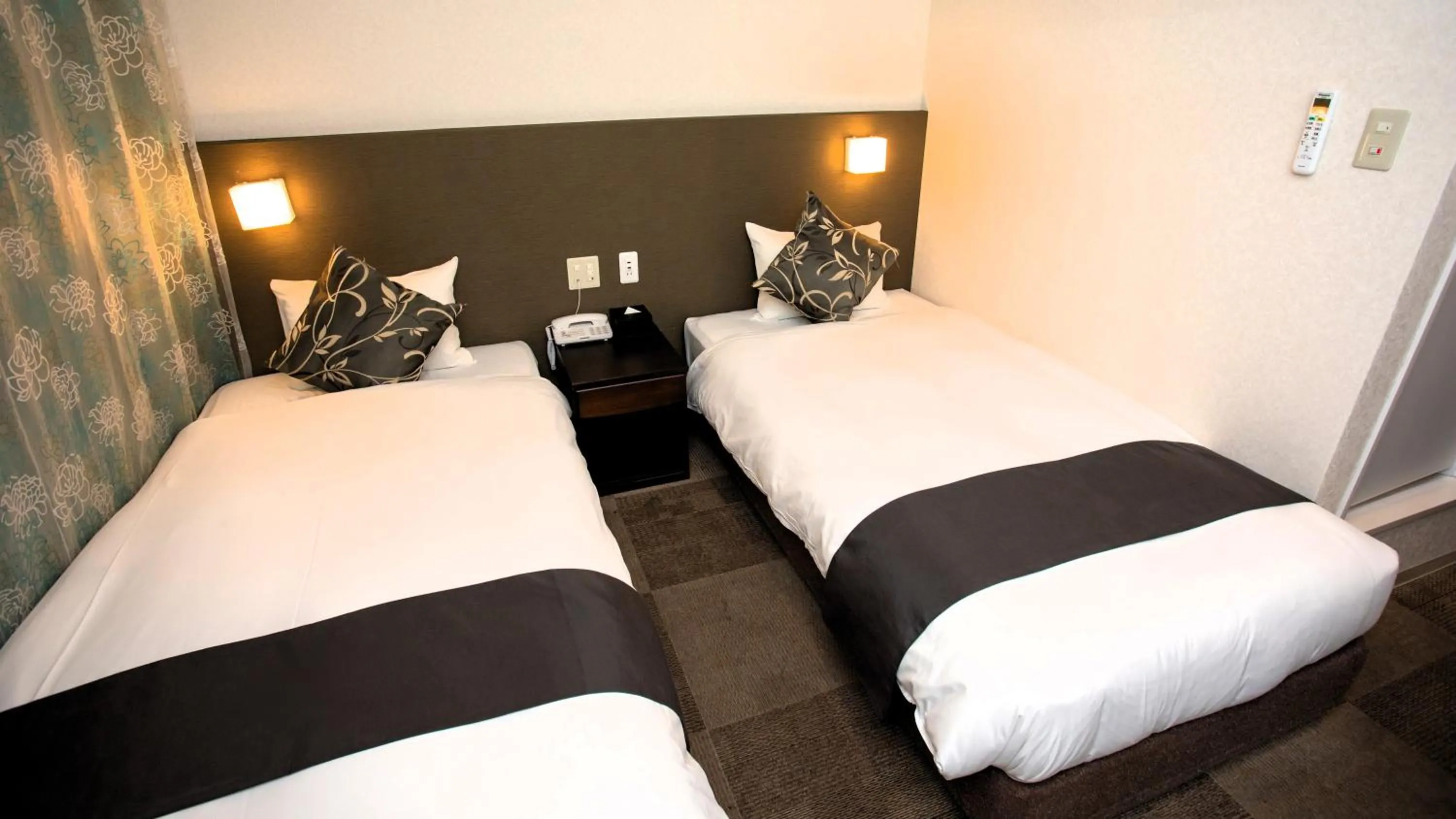 Photo of the whole room, Bed in Hotel Axiainn Osaka-Uehonmachi