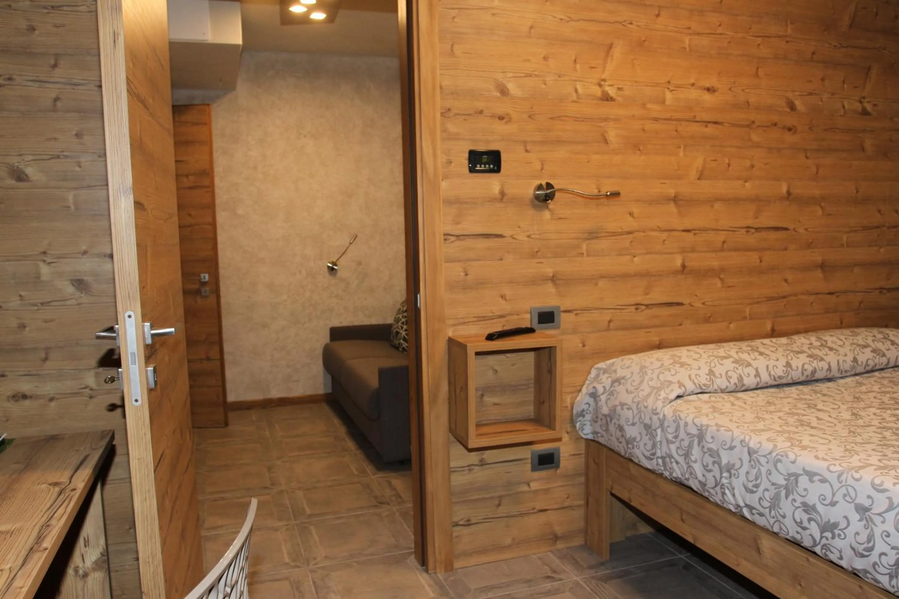 Photo of the whole room, Bed in Albergo Meublè Stelvio