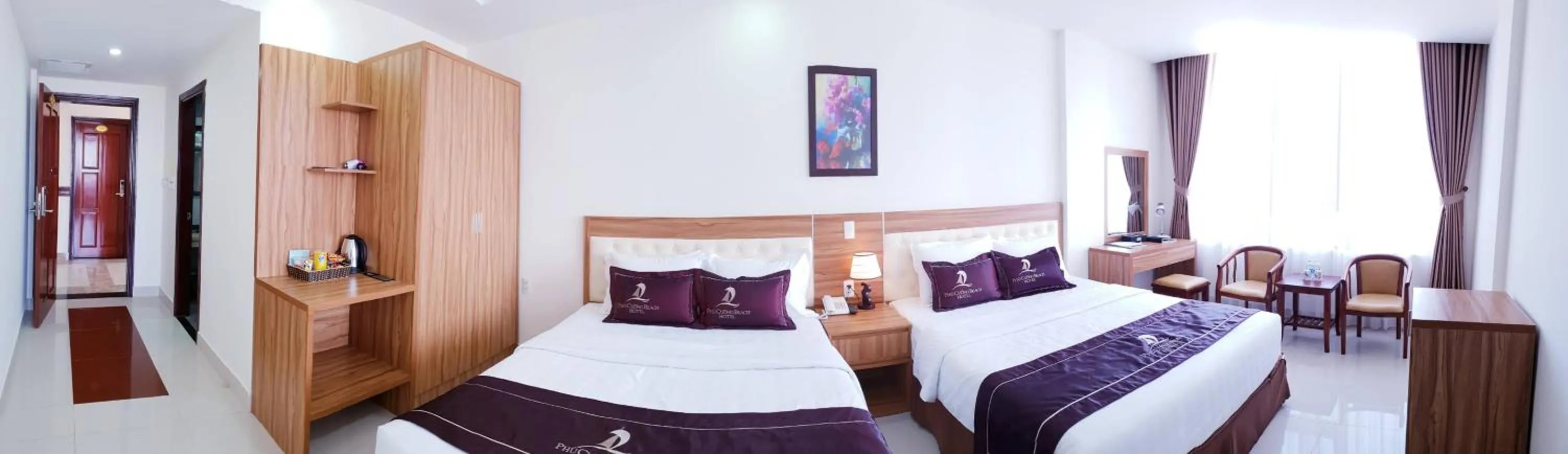 Bed in Phu Cuong Beach Hotel