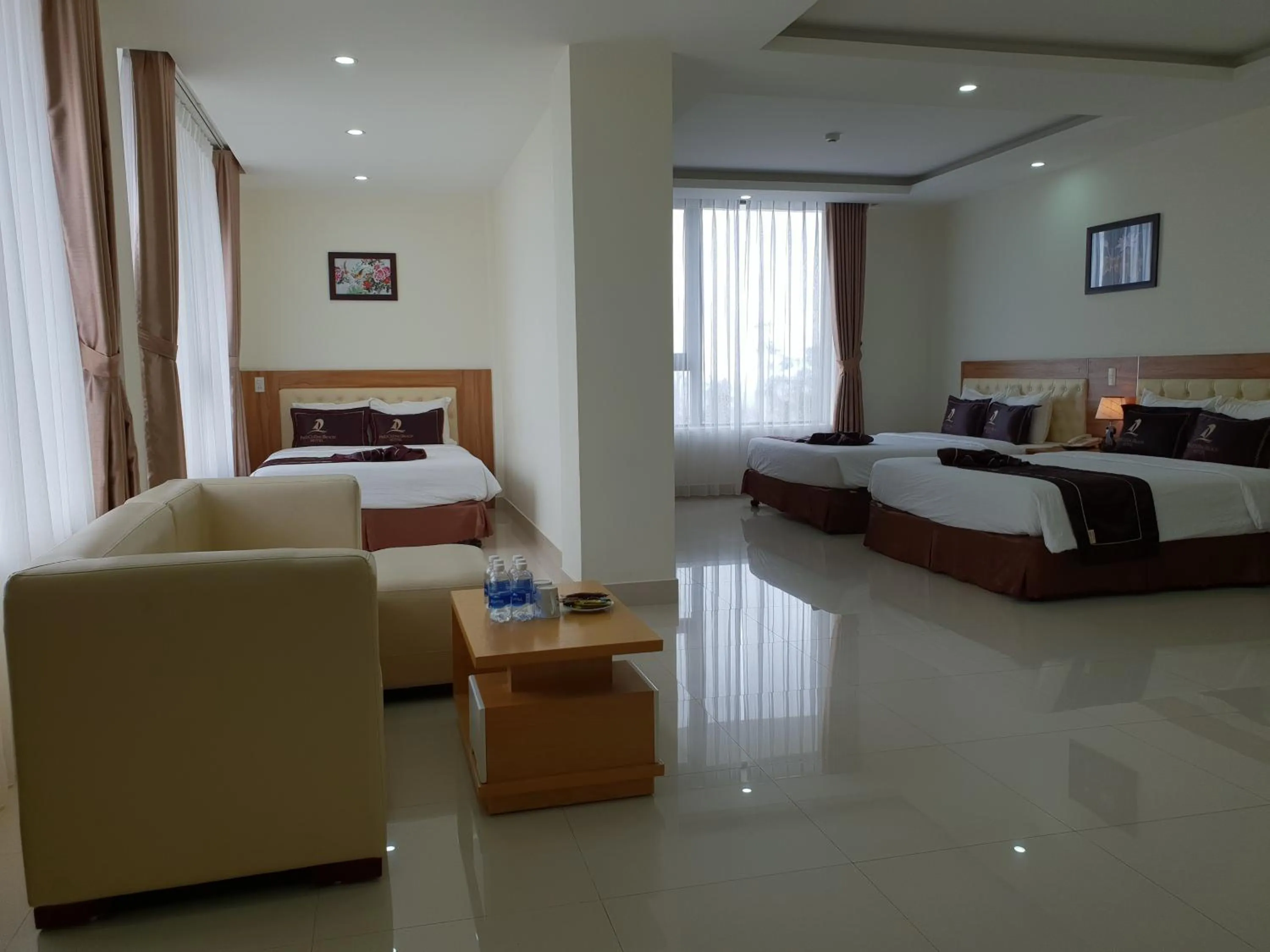 Living room, Bed in Phu Cuong Beach Hotel