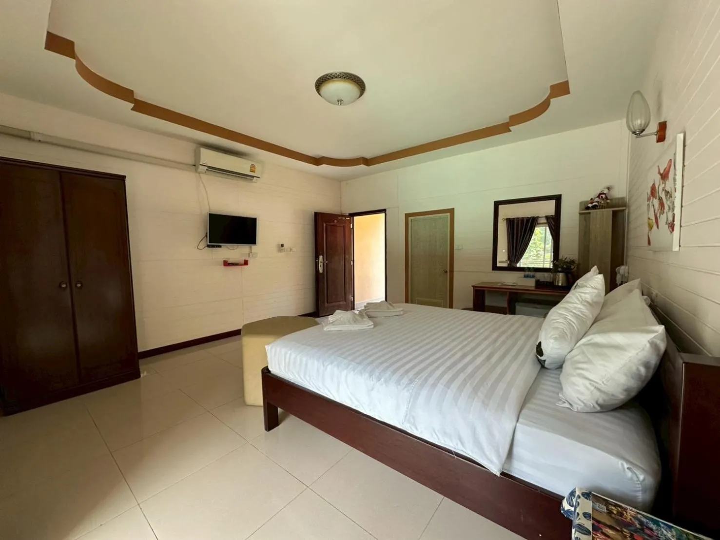 Bed in ชอว์ งาทอง รีสอร์ต Chor Ngar Thong Erawan Kanchanaburi