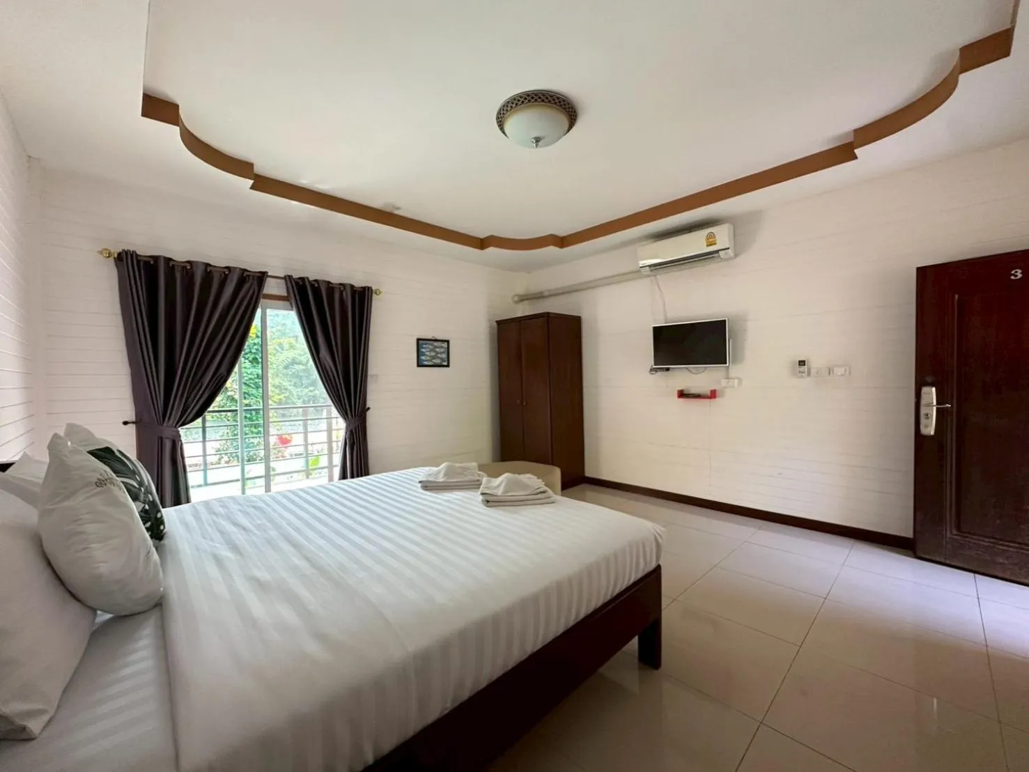 Bed in ชอว์ งาทอง รีสอร์ต Chor Ngar Thong Erawan Kanchanaburi