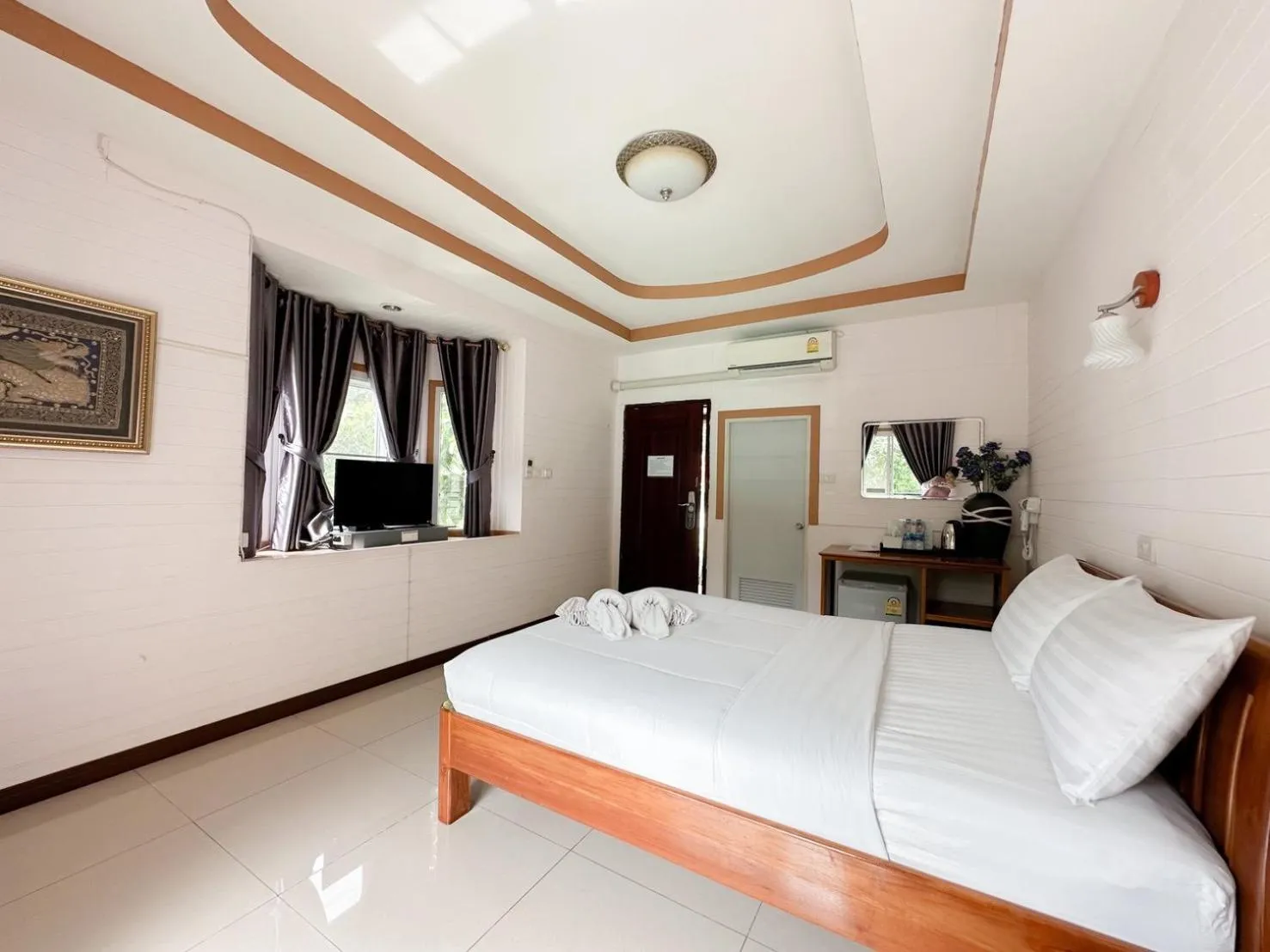 Bed in ชอว์ งาทอง รีสอร์ต Chor Ngar Thong Erawan Kanchanaburi