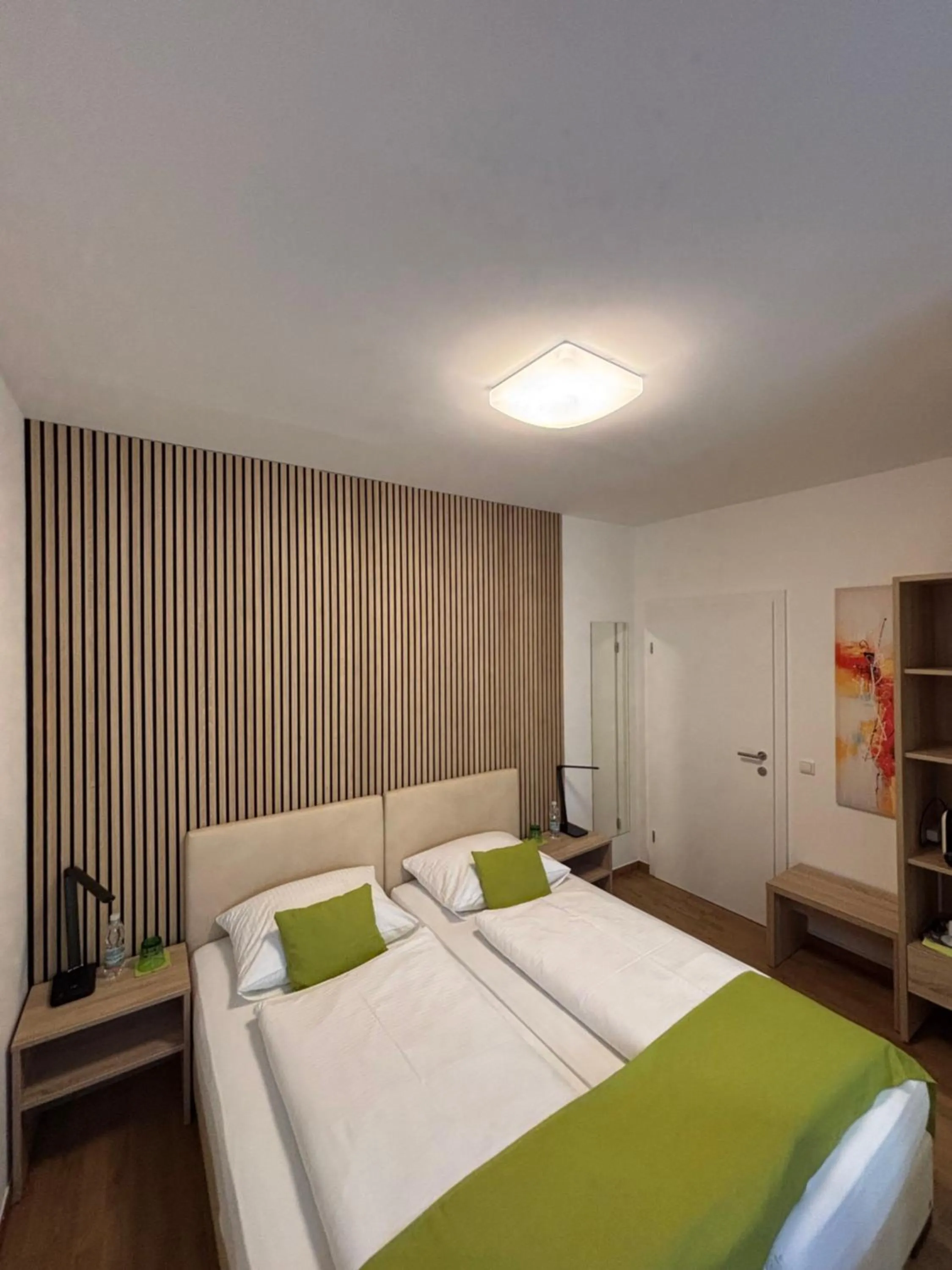 Bed in Hotel Garni Ilys Inn