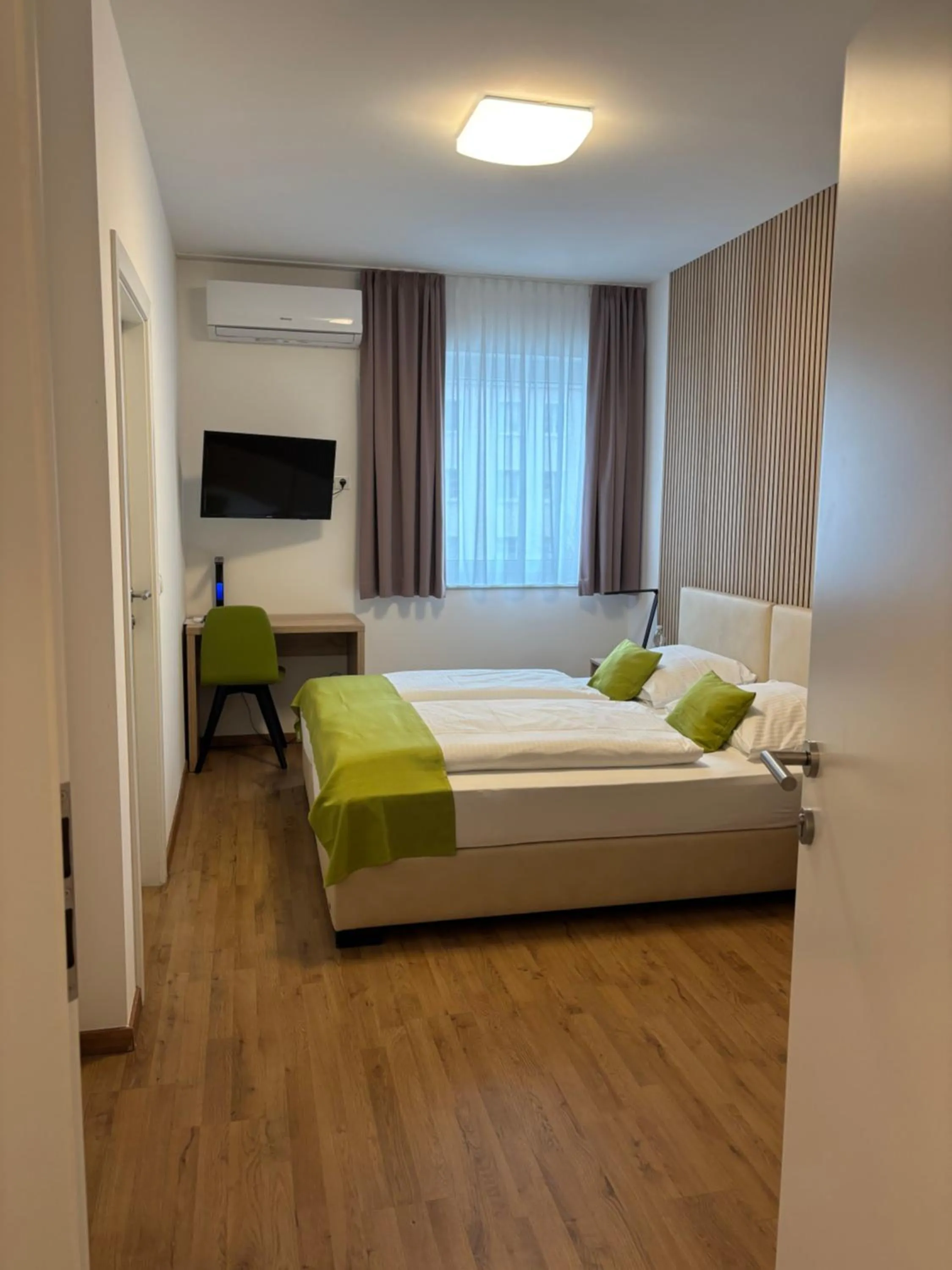 Bed in Hotel Garni Ilys Inn