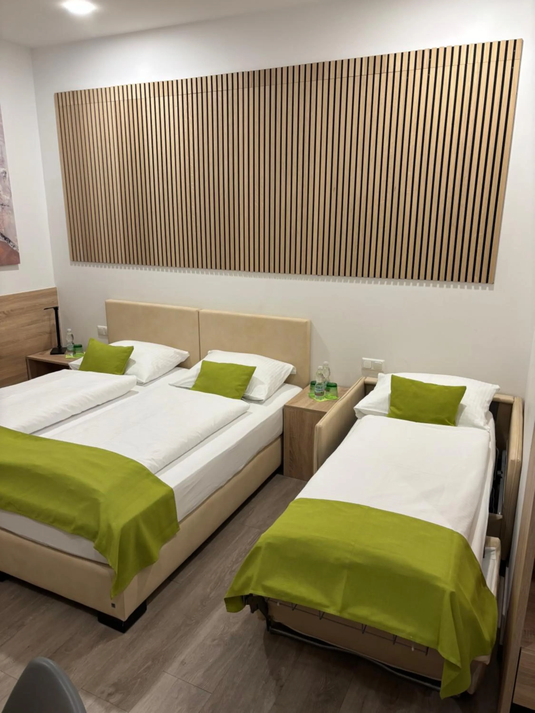 Bed in Hotel Garni Ilys Inn