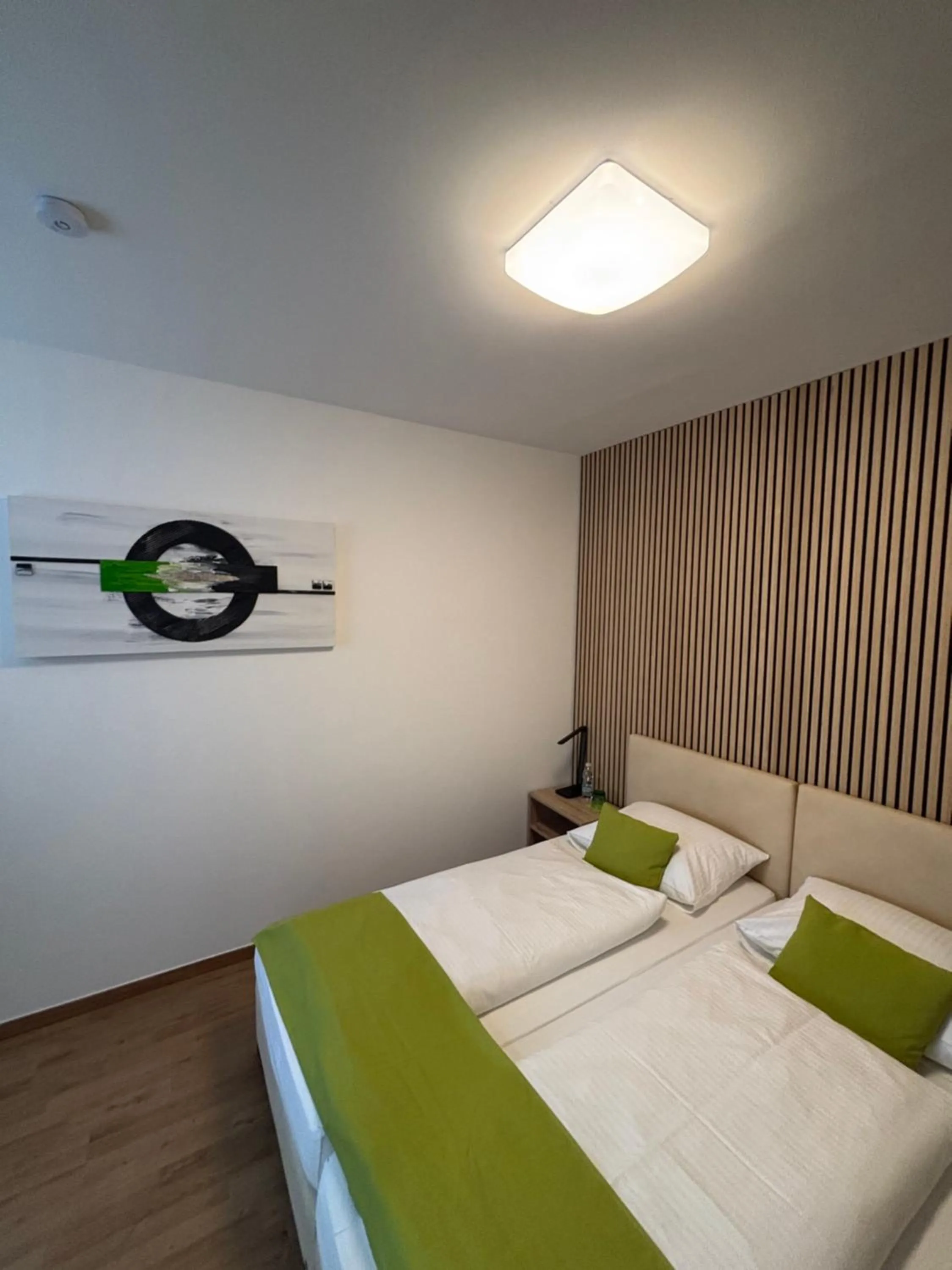 Bed in Hotel Garni Ilys Inn