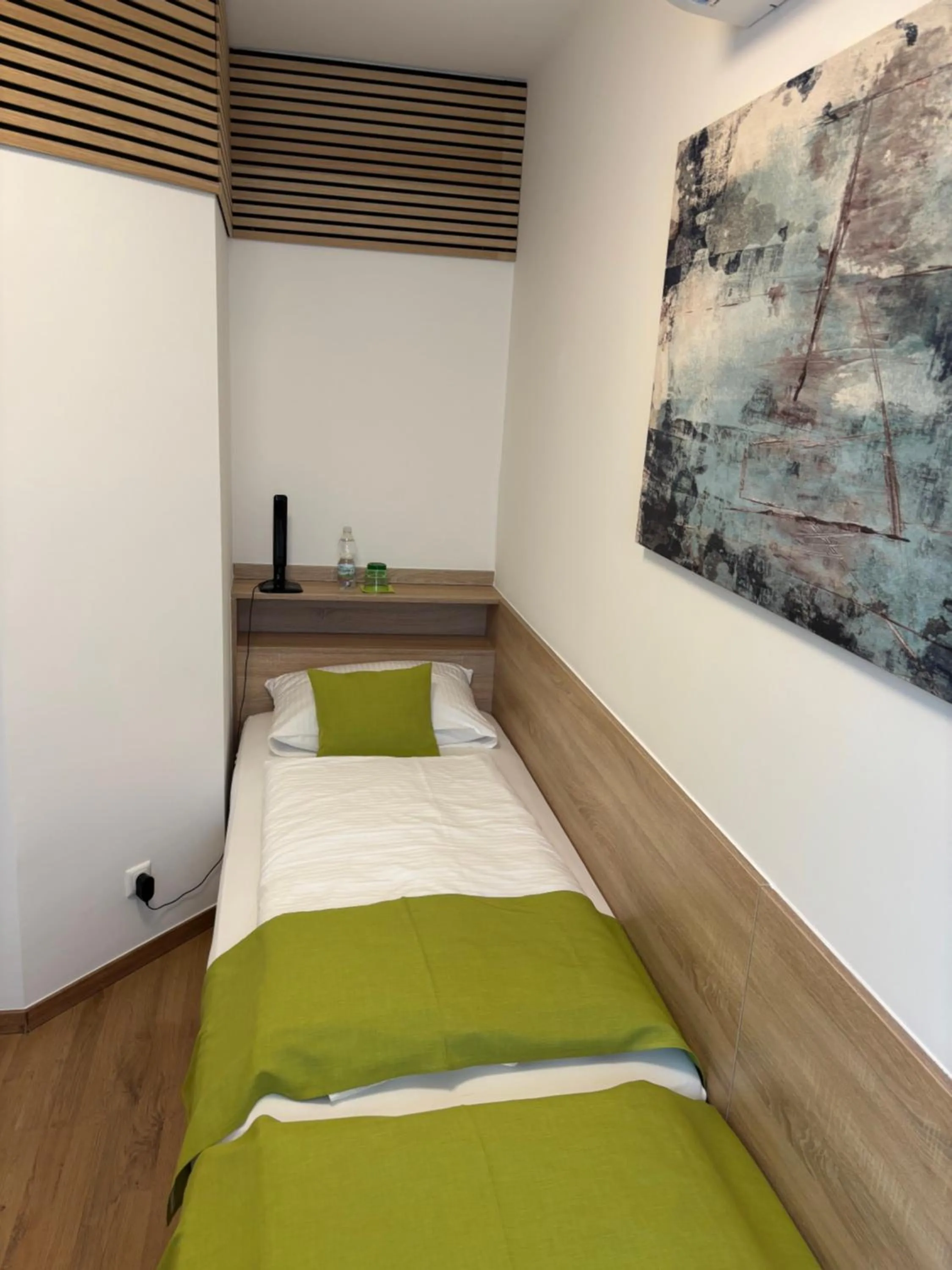 Bed in Hotel Garni Ilys Inn