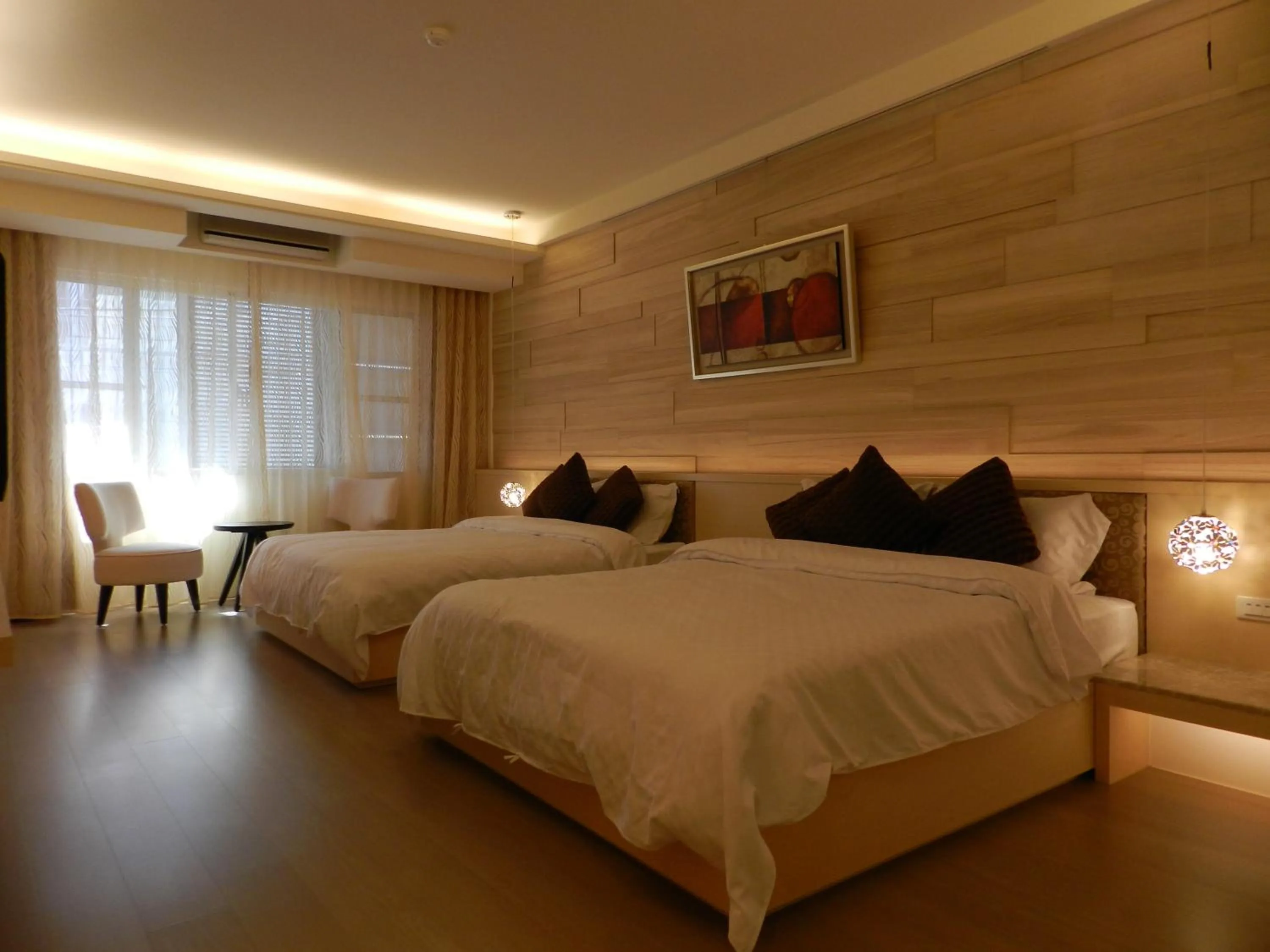 Bed in 谷關明高溫泉 Mingao Hot Spring Resort