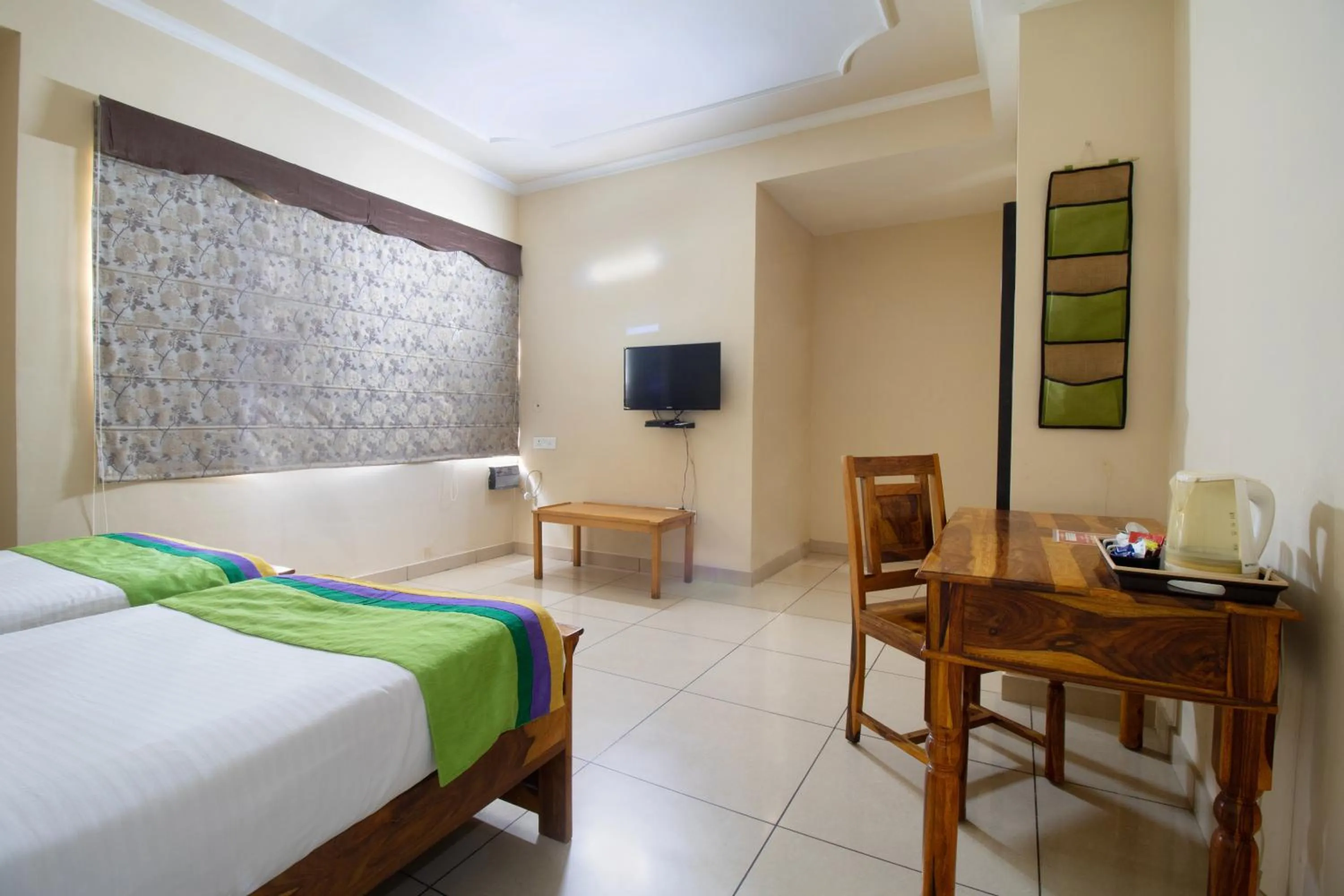 Bedroom, Bed in Treebo The Anchorage Malviya Nagar