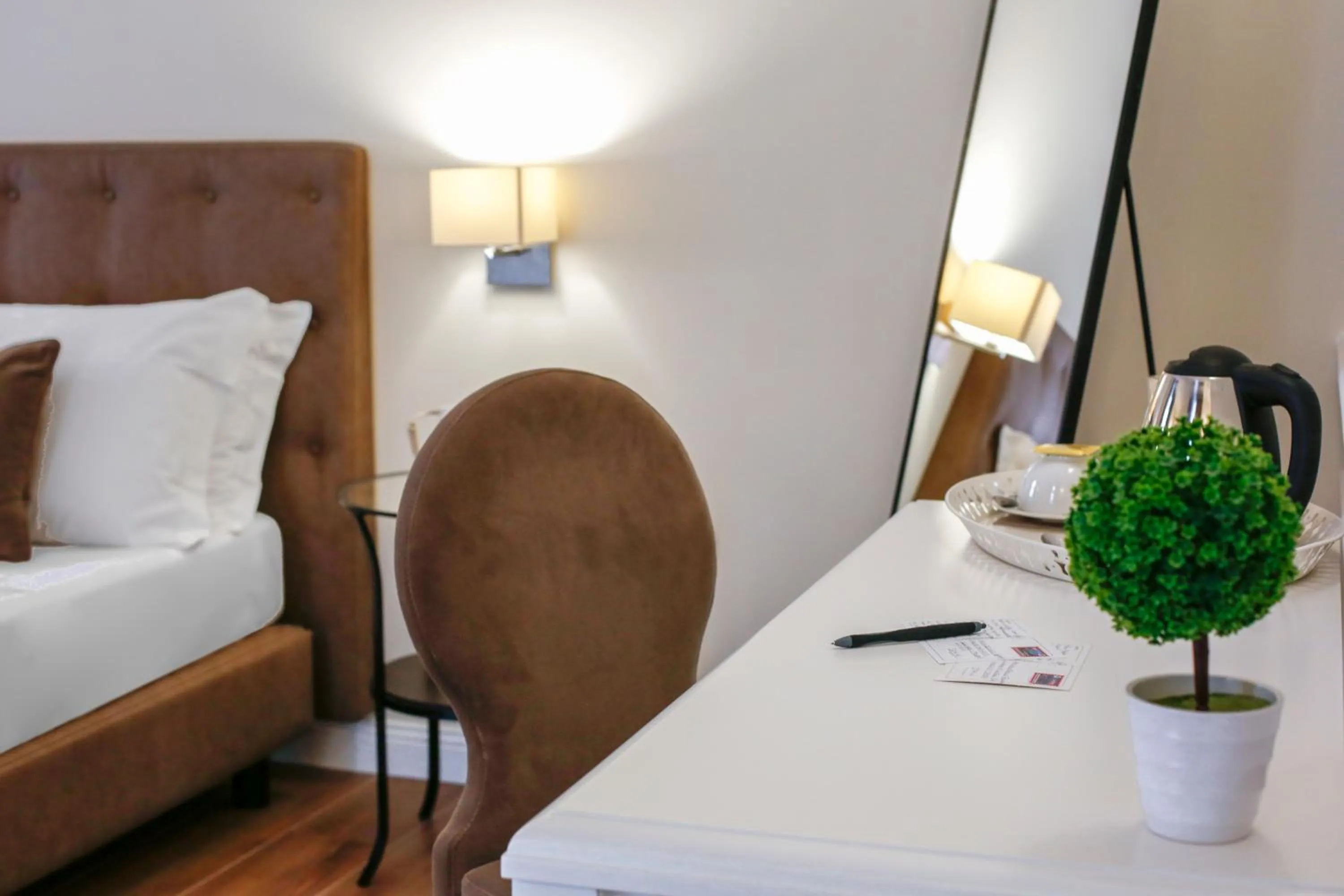 Decorative detail, Bed in La Fontanina Suites