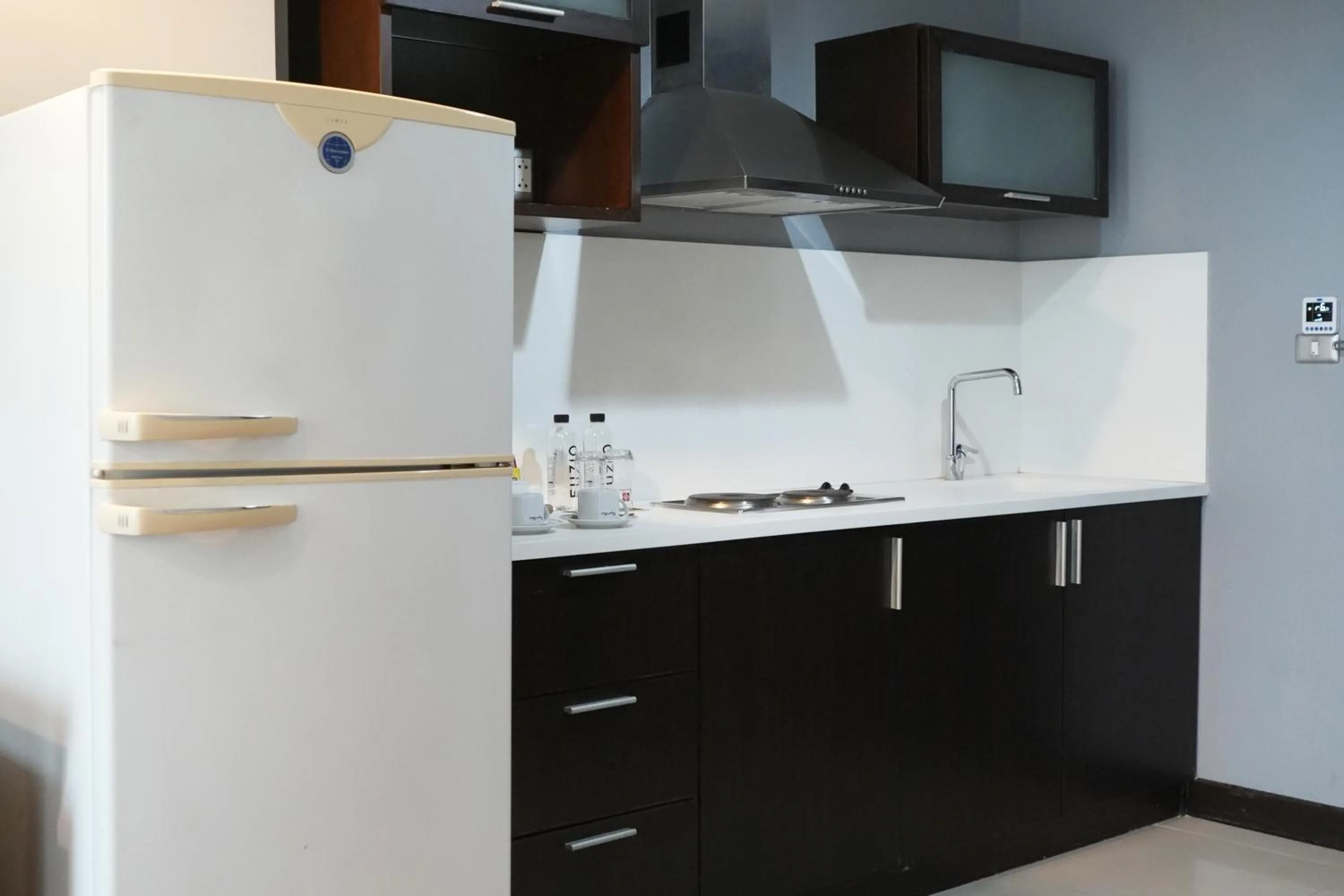 Kitchen or kitchenette in Royal Suite Hotel Bangkok