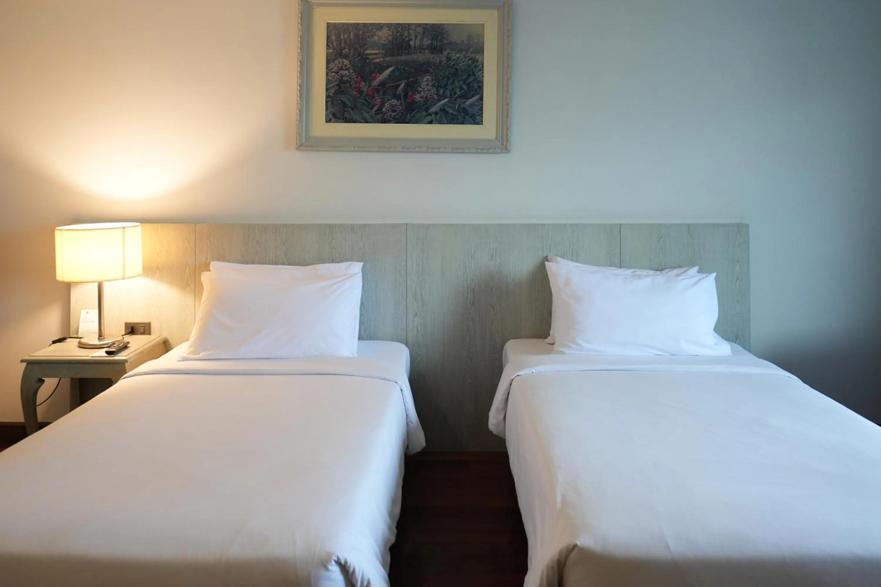 Bed in Royal Suite Hotel Bangkok