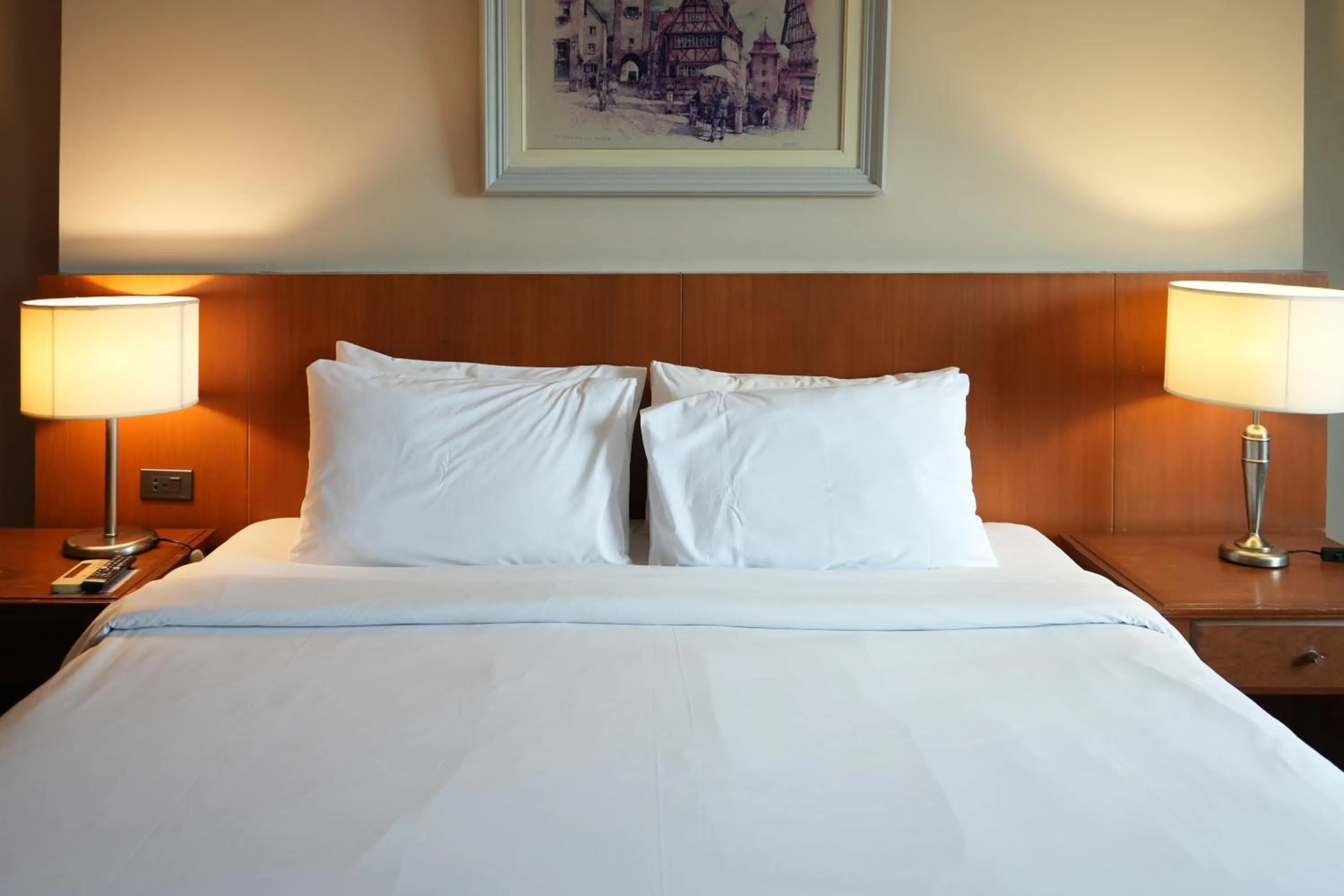 Bed in Royal Suite Hotel Bangkok