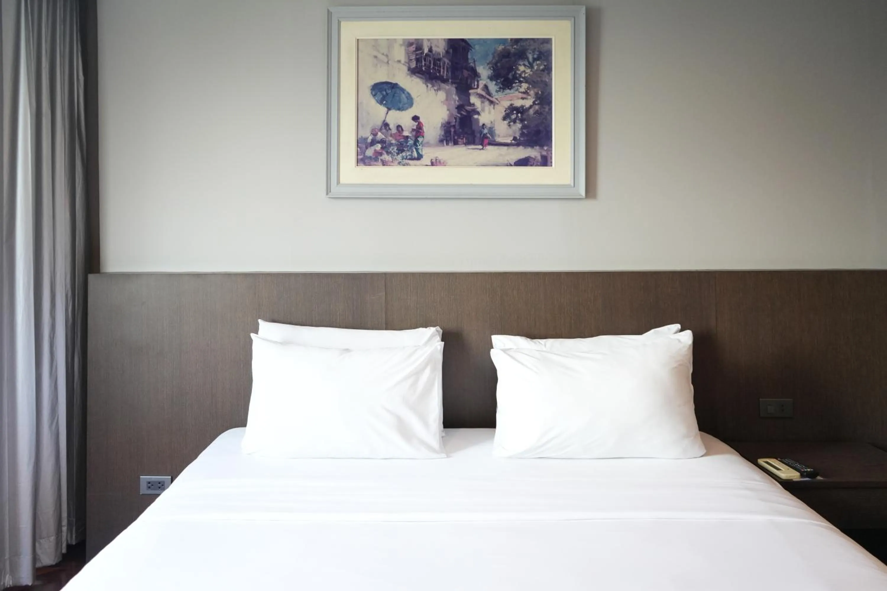 Bed in Royal Suite Hotel Bangkok