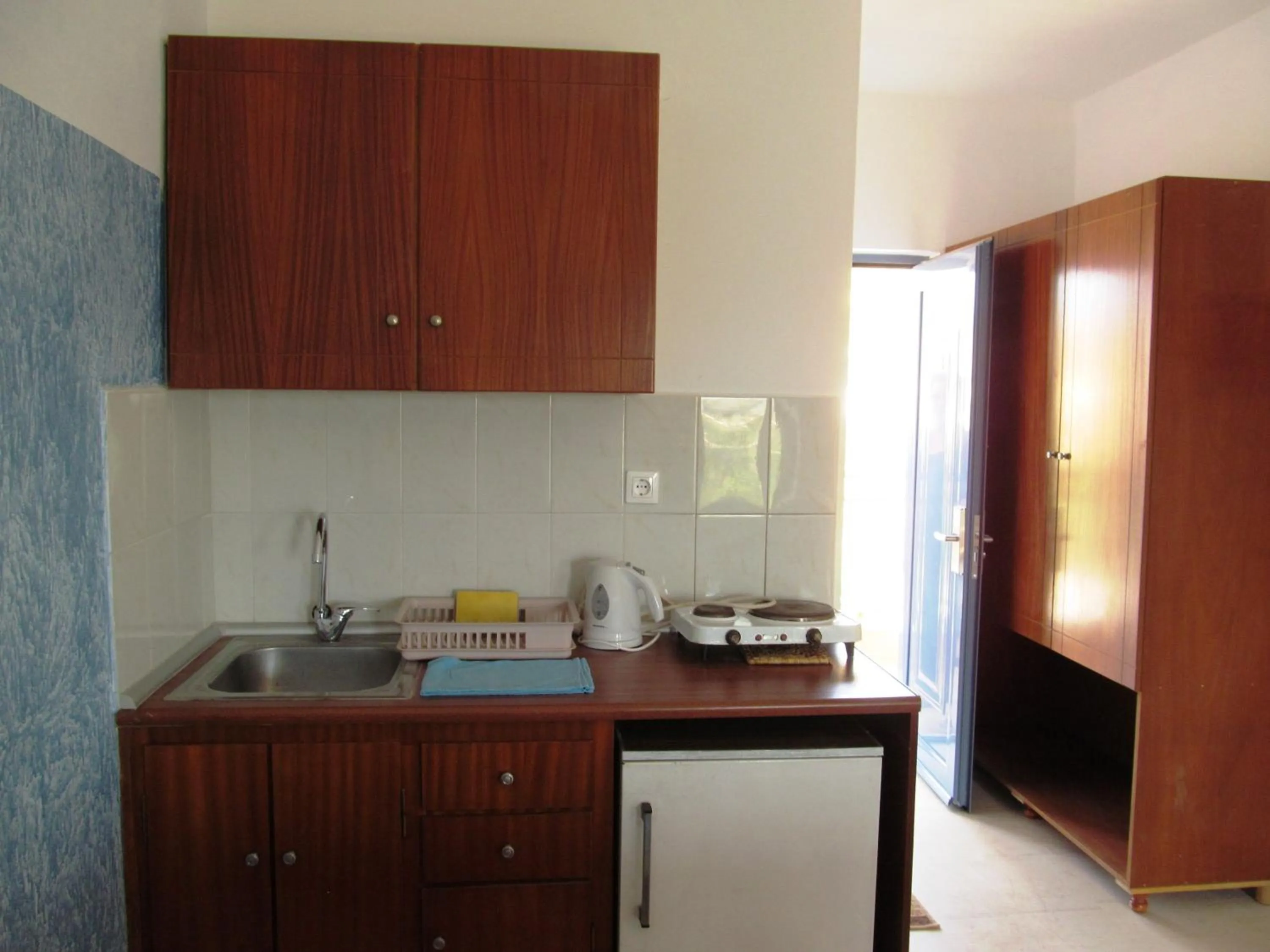 Kitchen or kitchenette in Paraschos Studios Kos