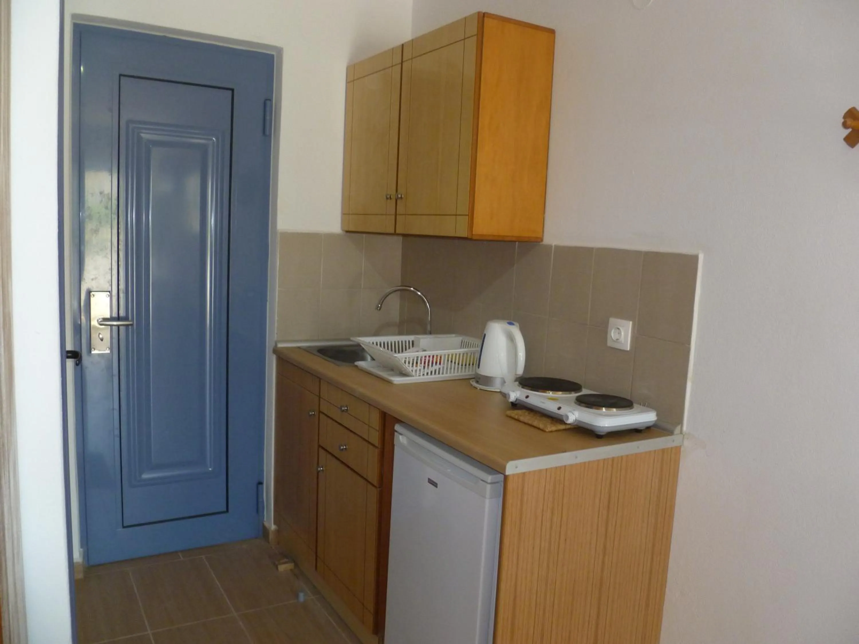 Kitchen or kitchenette in Paraschos Studios Kos