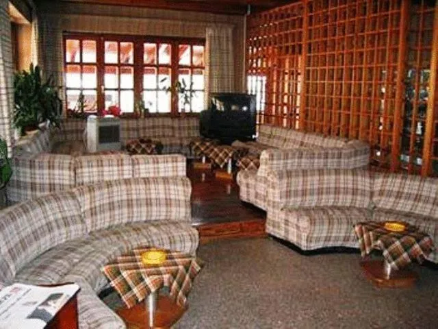 Communal lounge/ TV room in Hotel Quo Vadis