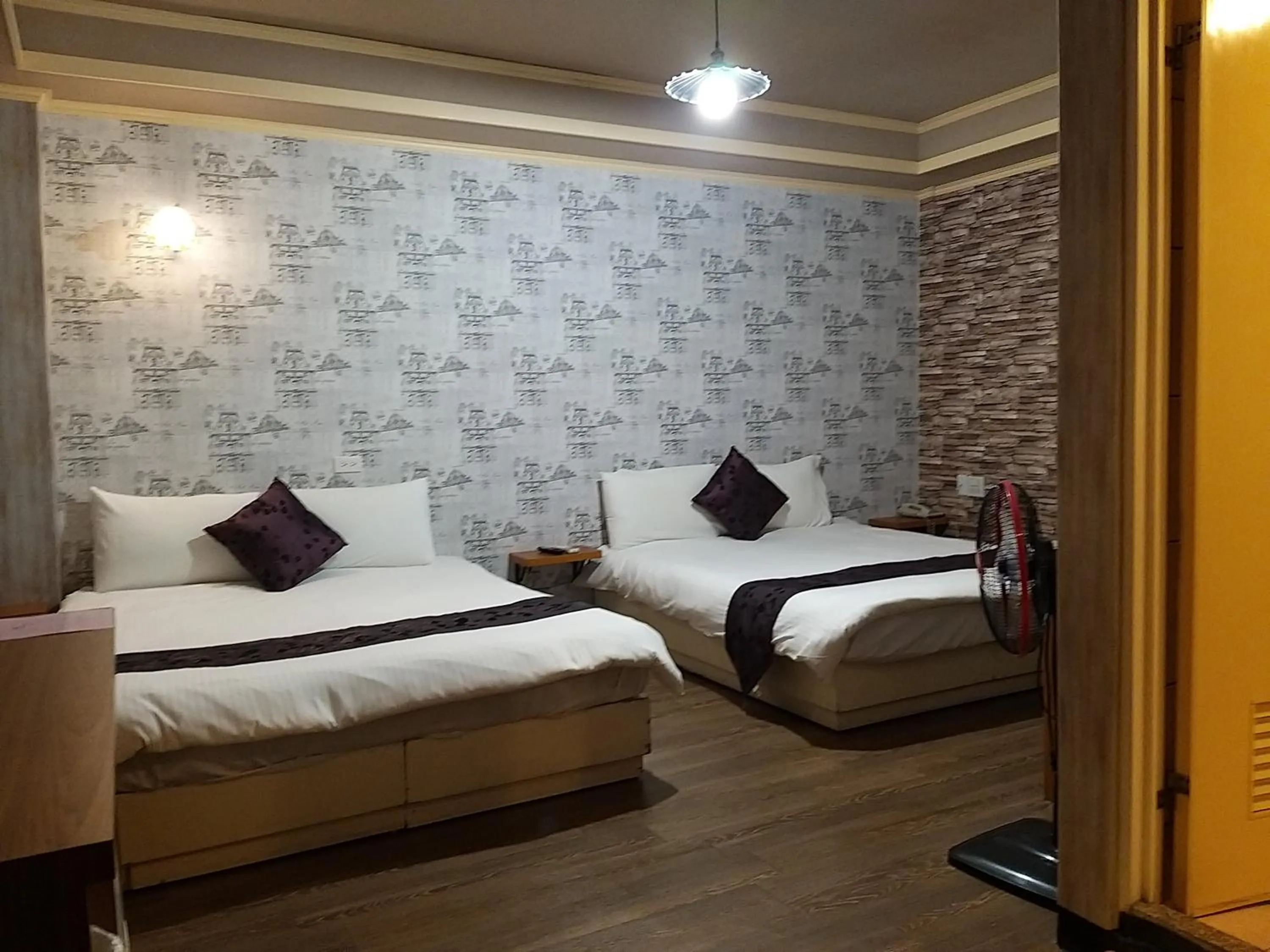 Bed in Guan Lun Hotel