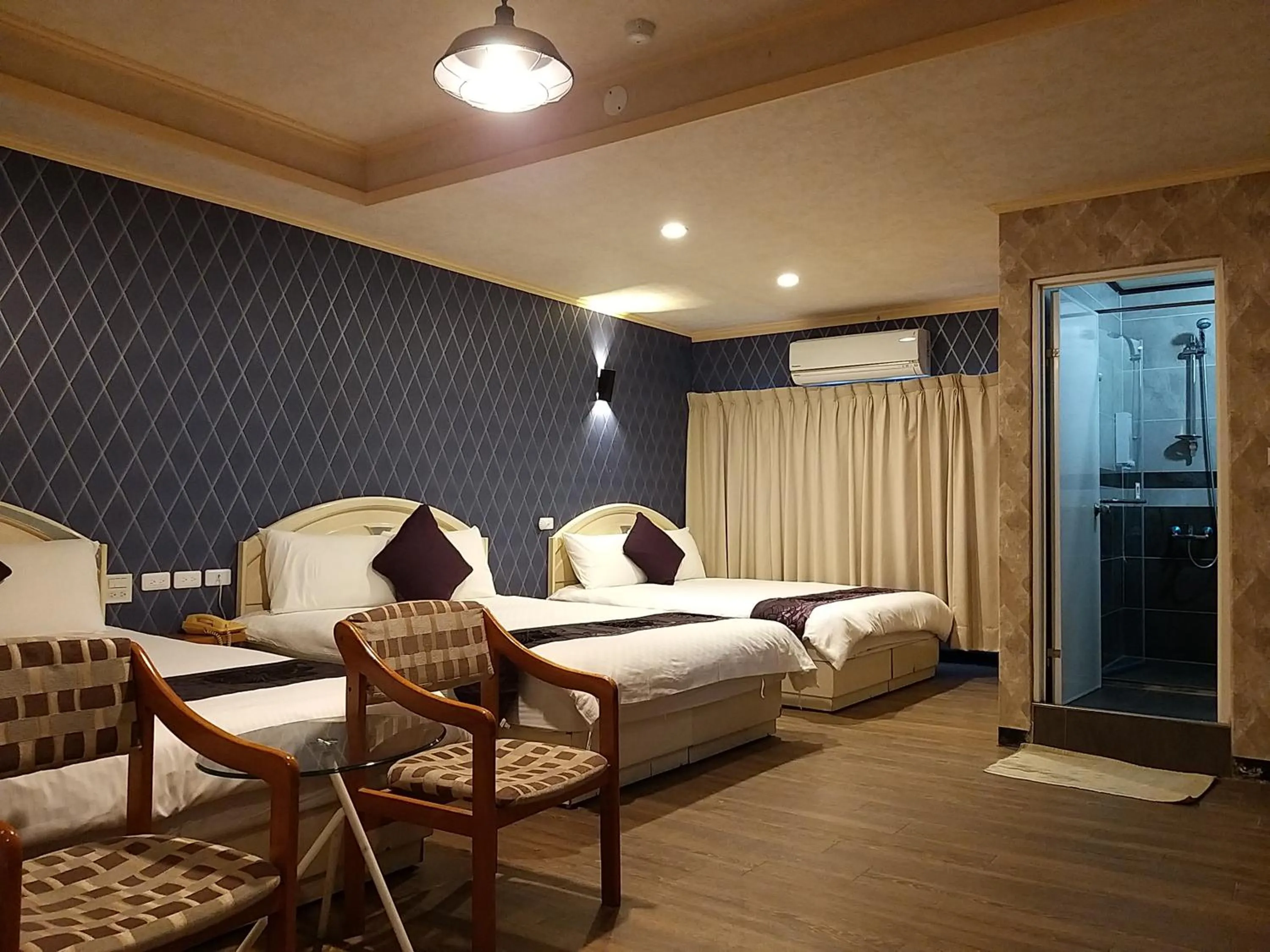 Bed in Guan Lun Hotel