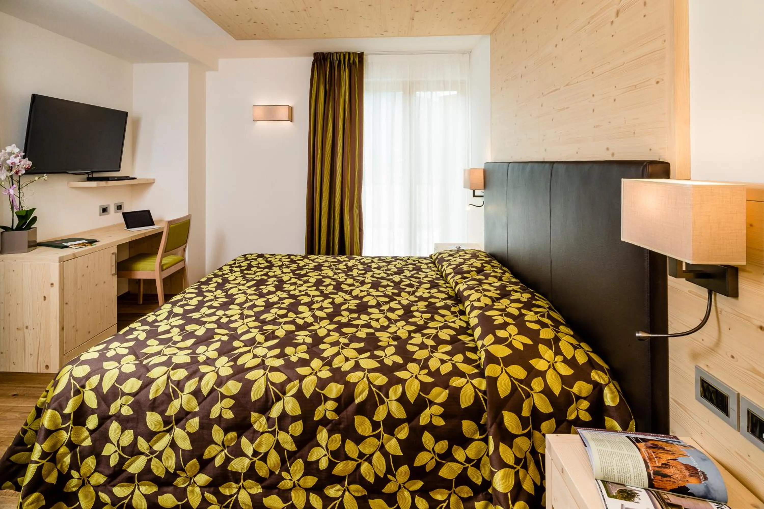 Bed in Family Hotel Serena