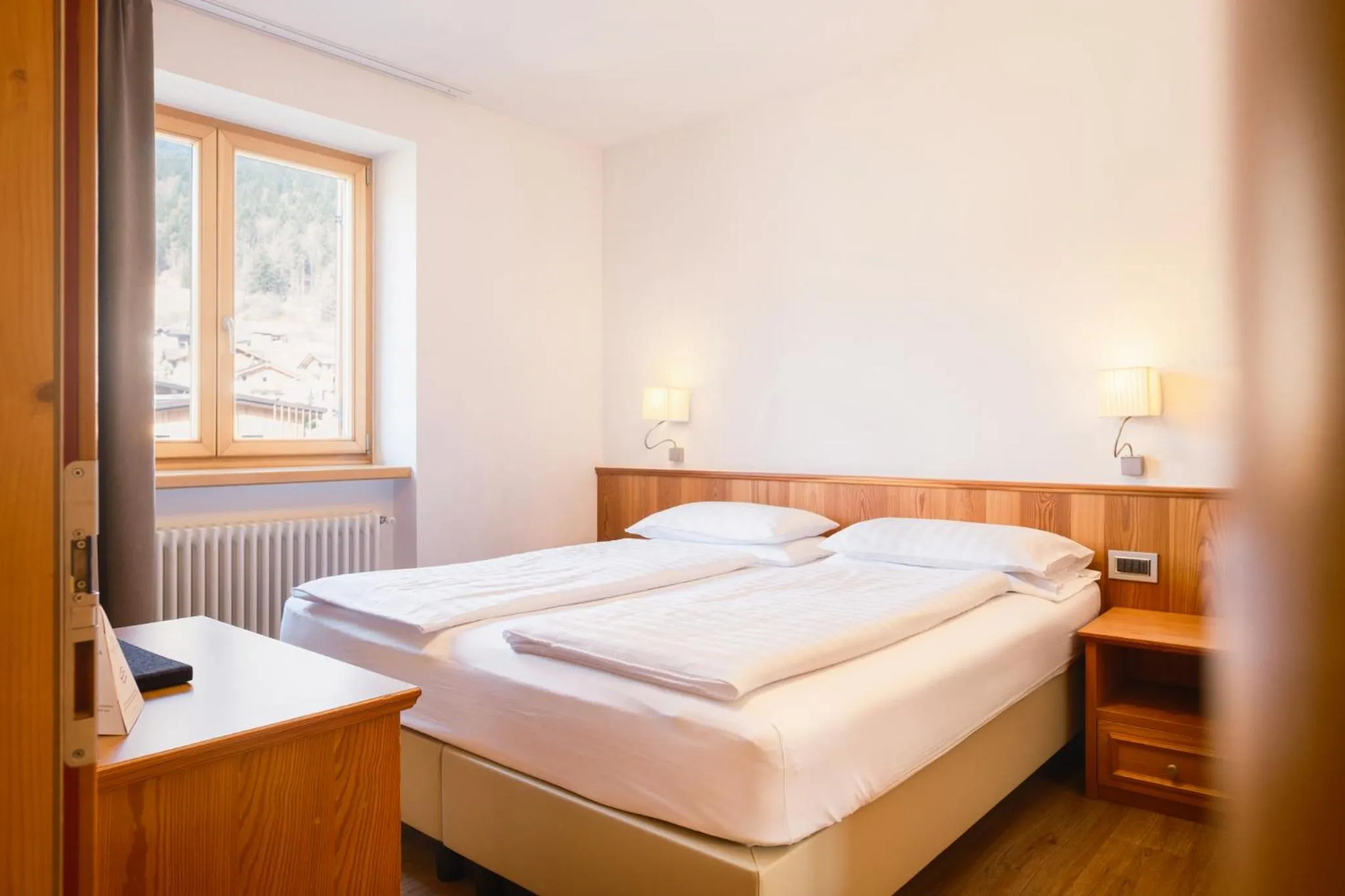 Bed in Family Hotel Serena