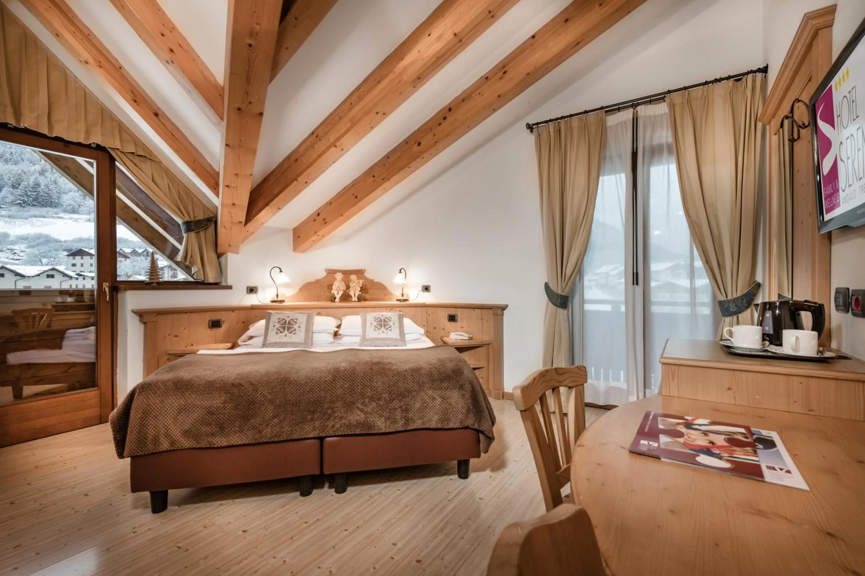 Bed in Family Hotel Serena