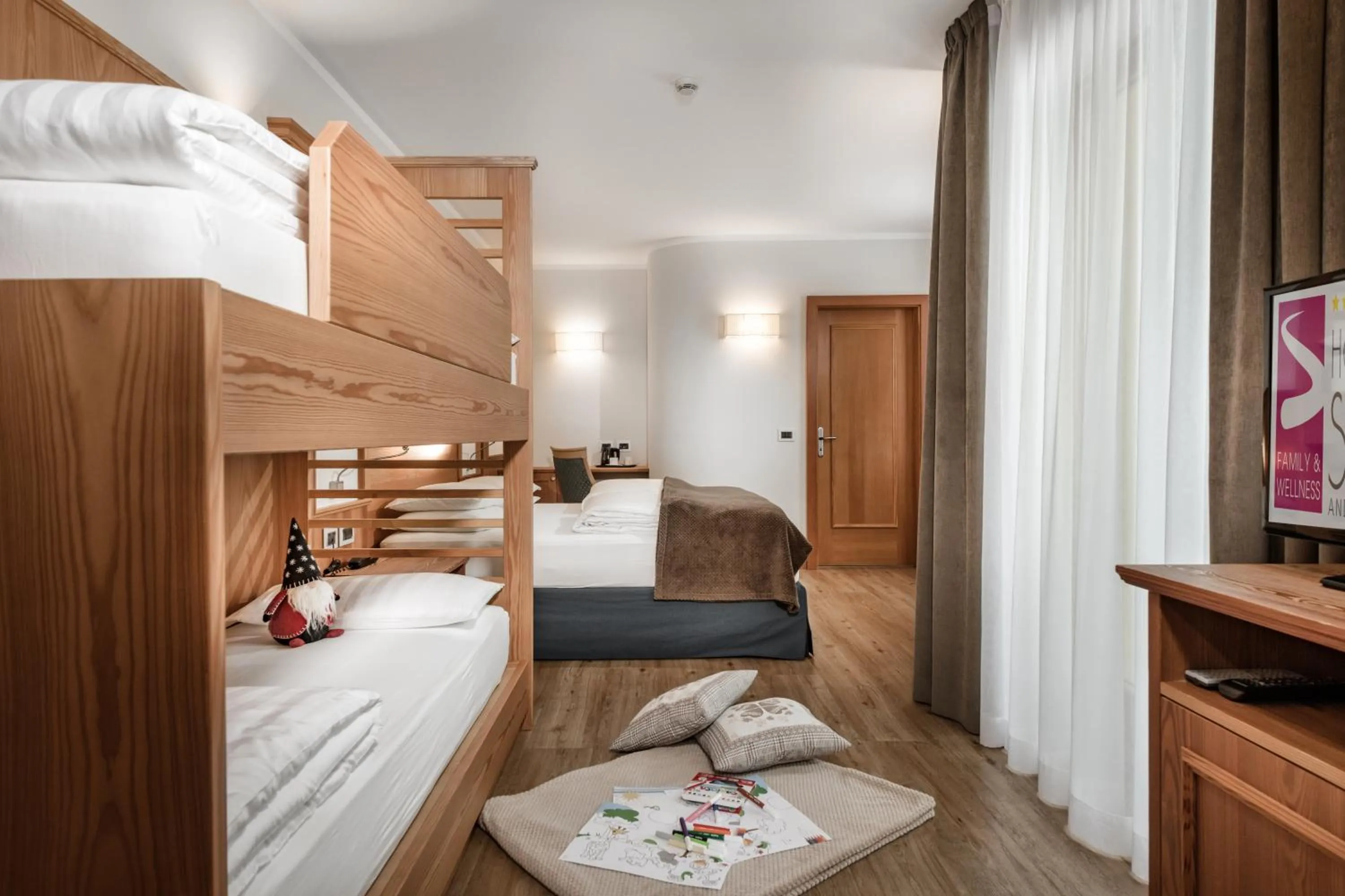 Bed in Family Hotel Serena