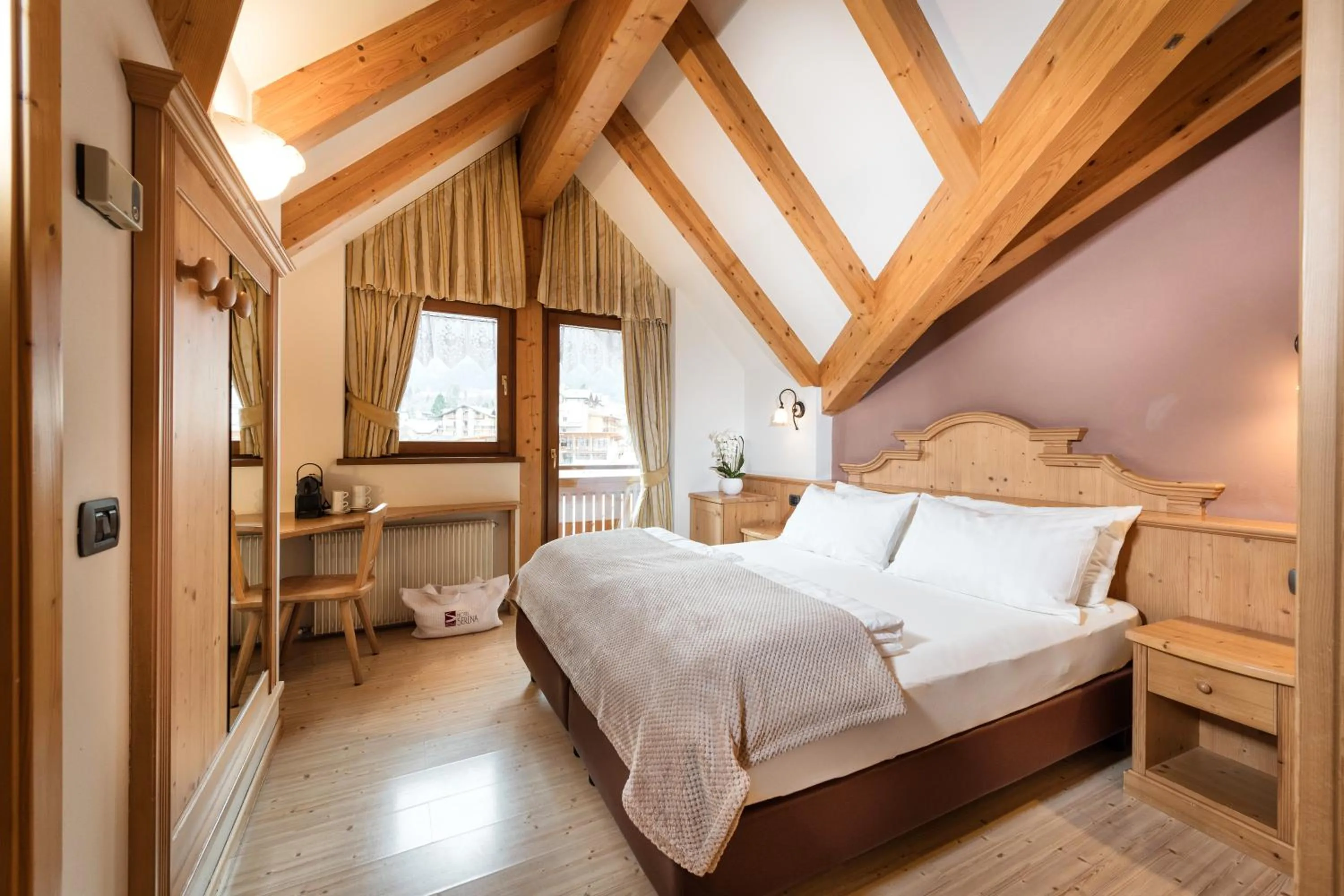 Bed in Family Hotel Serena